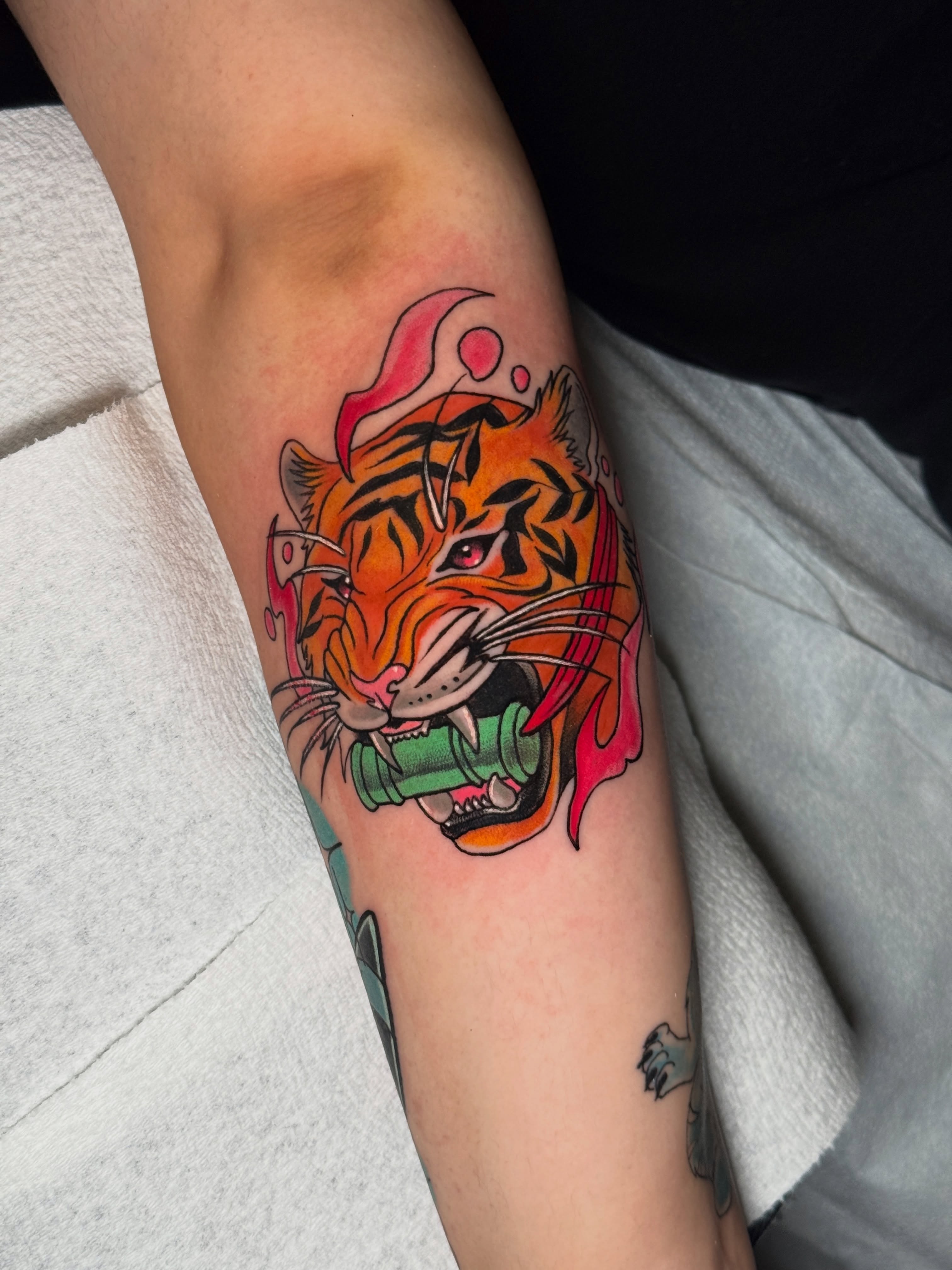Tiger American traditional tattoo on the forearm by ⓒⓨⓡⓤⓢ