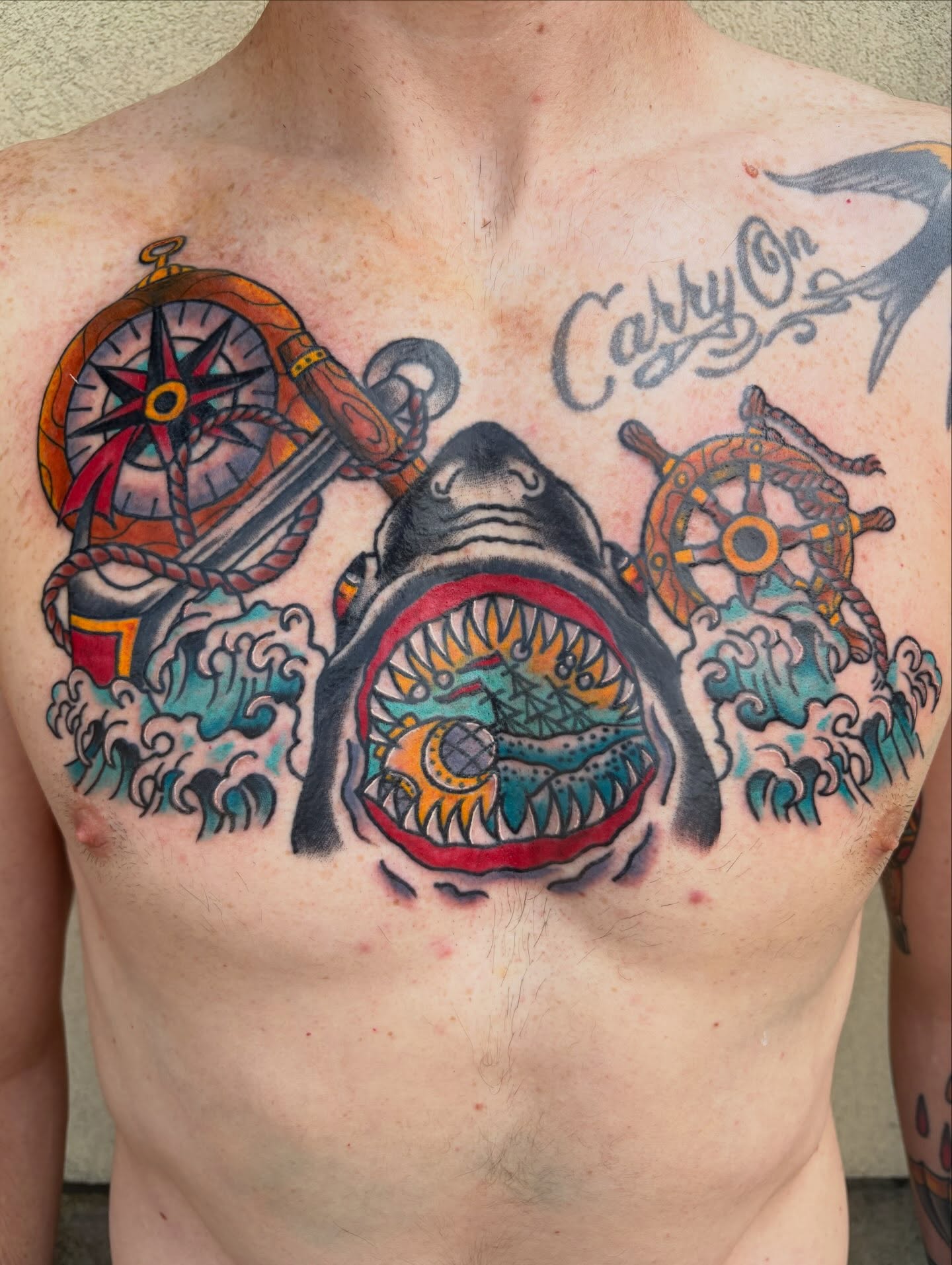 Shark American traditional tattoo on the chest by Scrap Iron Tattoos