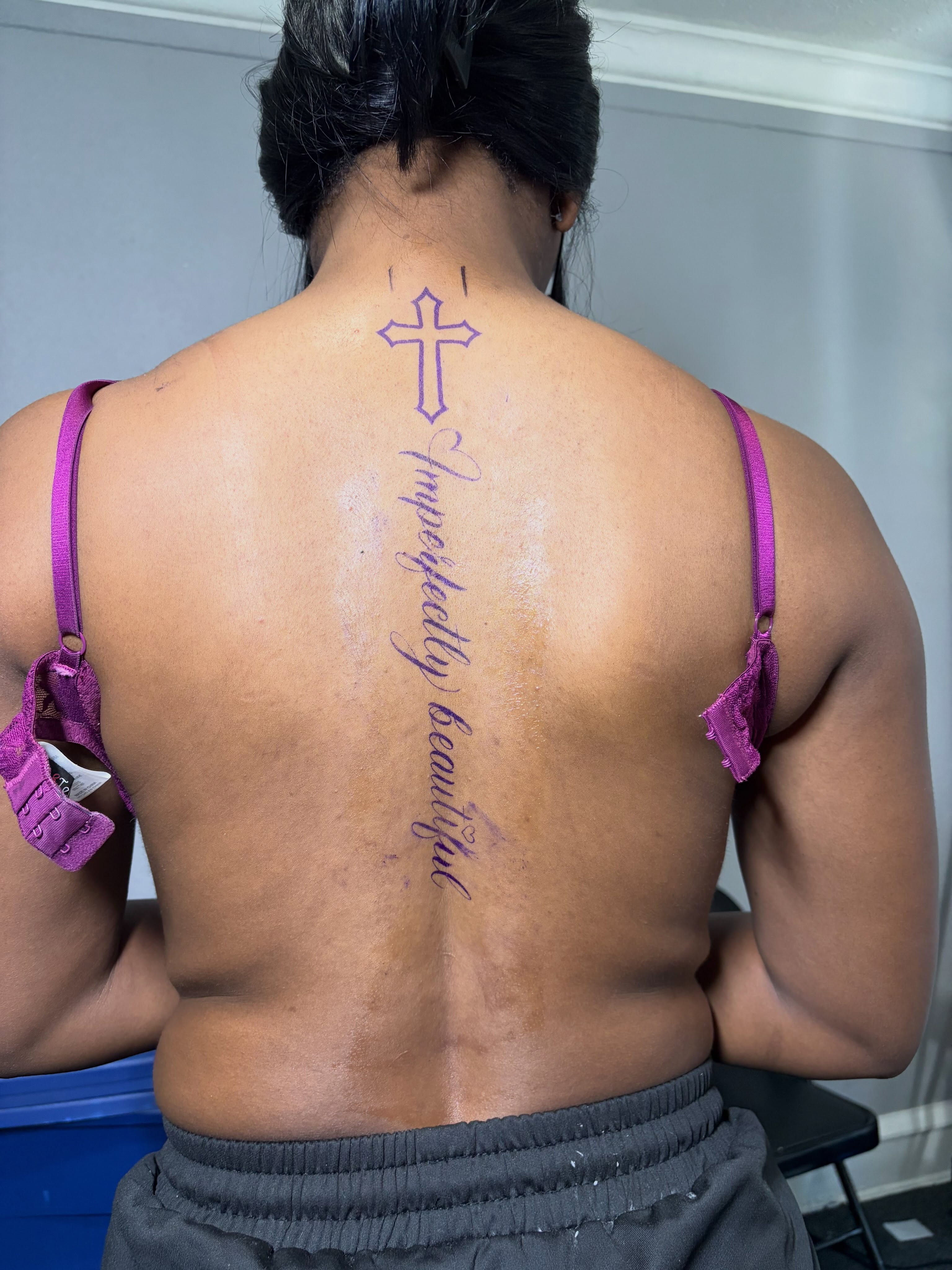 Cross and cursive text lettering script tattoo on the back by 216 Tattoos 🥰