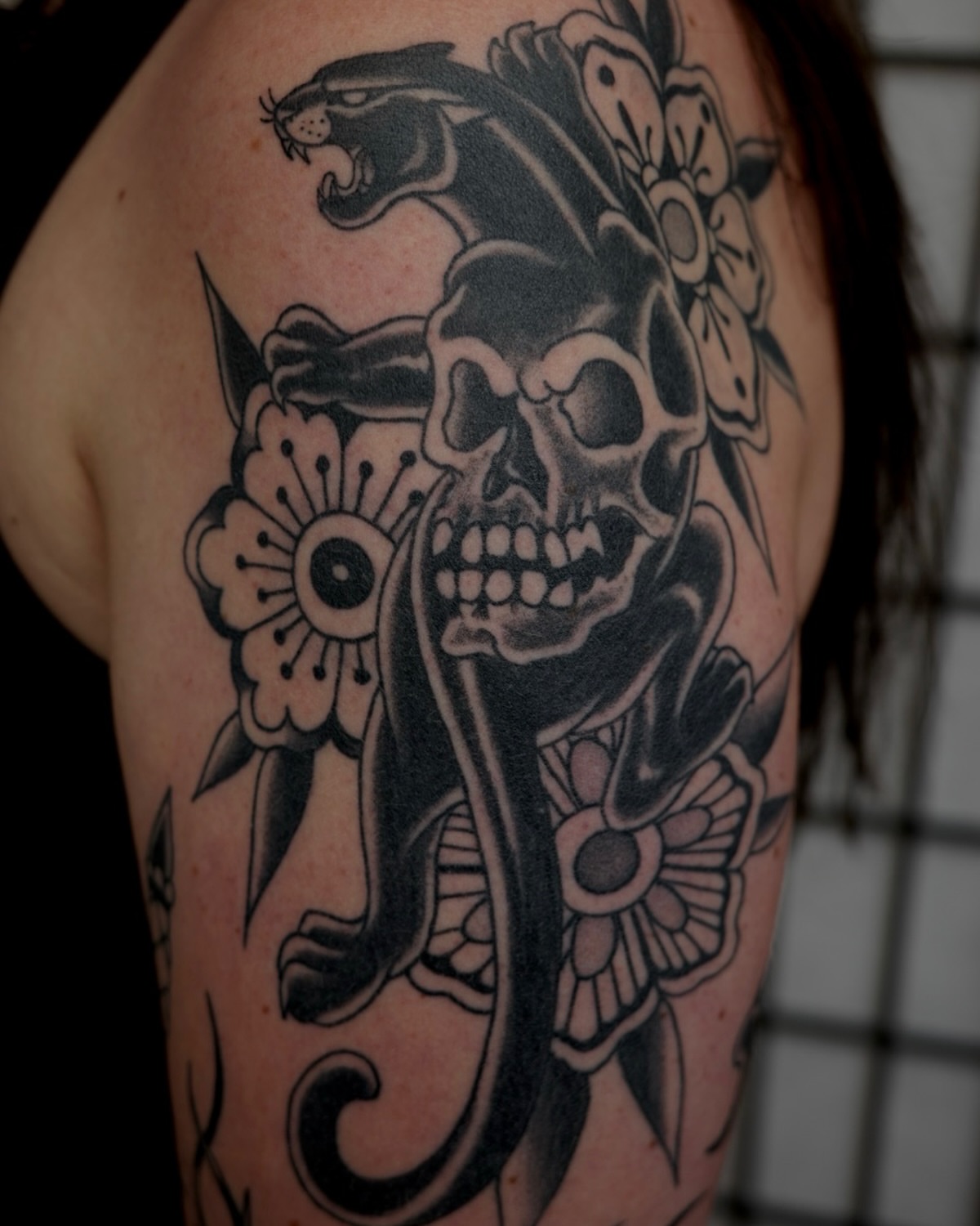 Skull and panther realism tattoo on the shoulder by Sequoia Rose, Portland, Oregon
