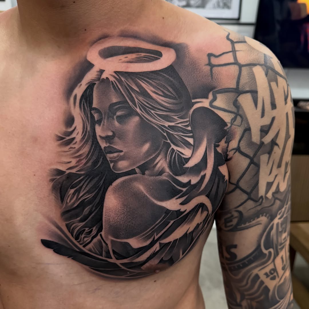 Tattoo by @bigtoons21 — realism, black_and_grey