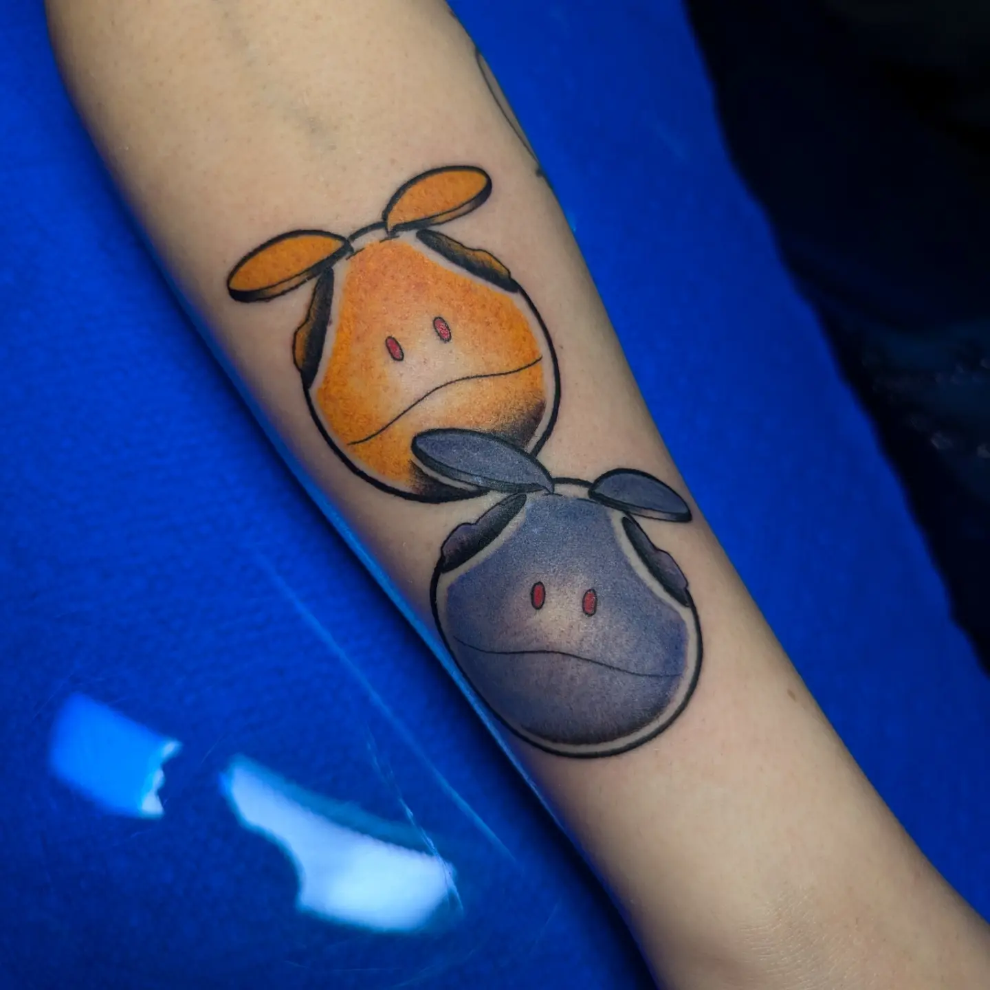 Two cartoon cows dotwork tattoo on the forearm by 𝐈𝐚𝐧 𝐒𝐞𝐭𝐡 🕷️ Austin