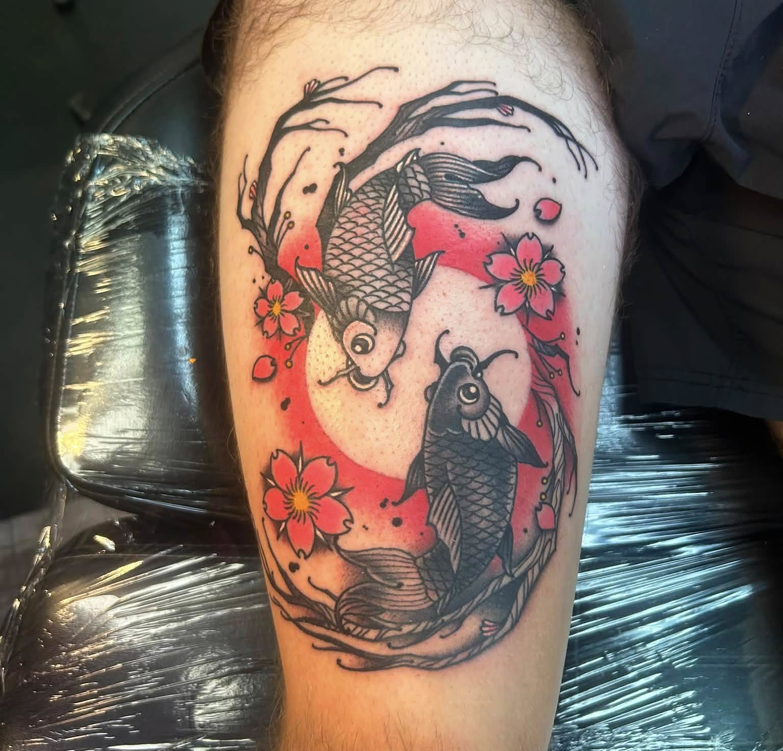Koi fish and cherry blossoms japanese irezumi tattoo on the thigh by Daemion