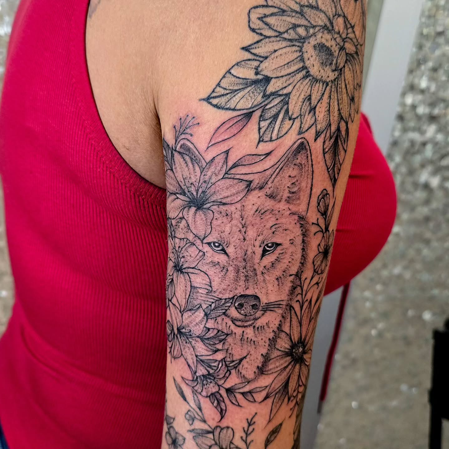 Wolf and flowers realism tattoo on the forearm by Hope 🌙, Cincinnati