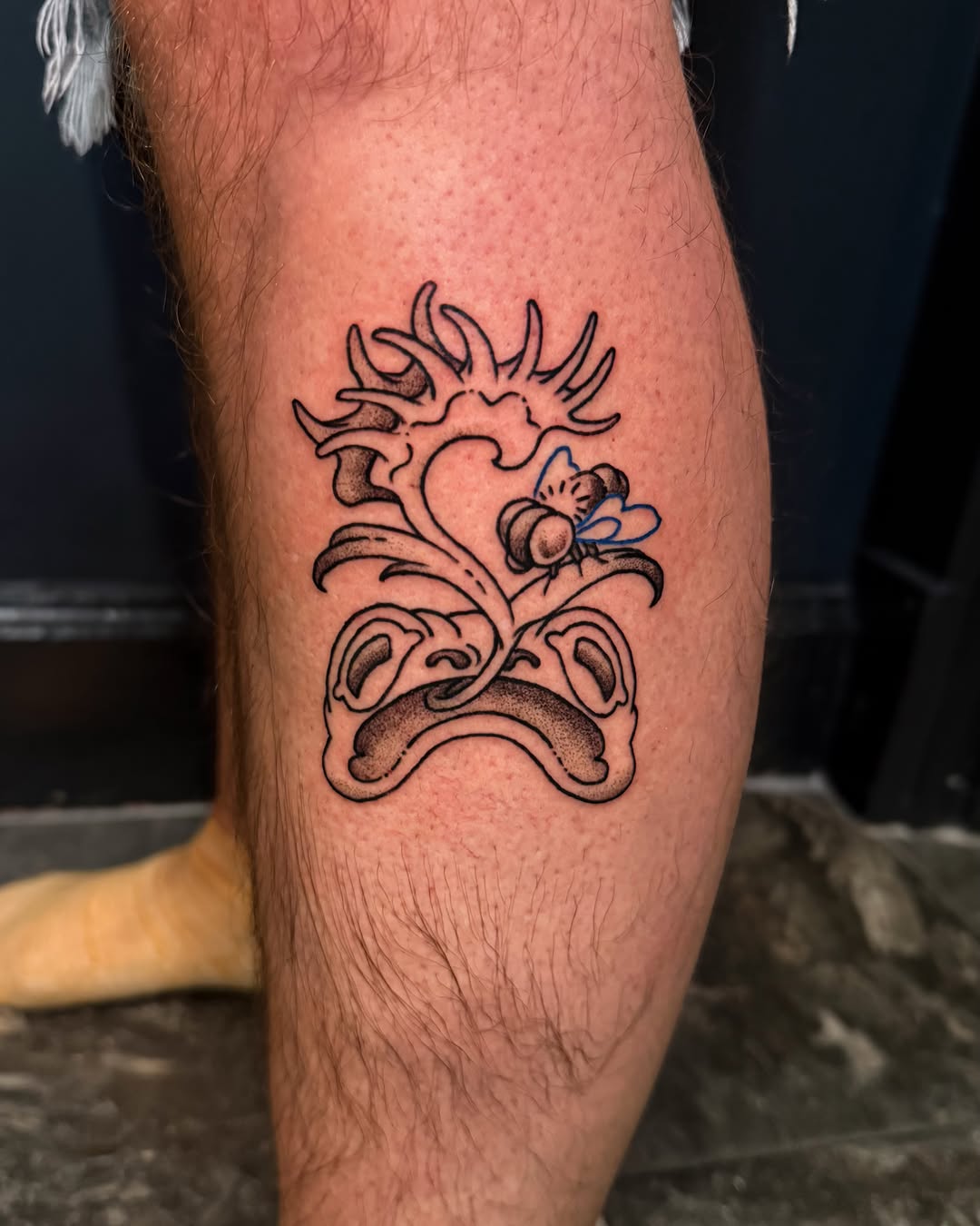 Heart with floral elements neo-traditional tattoo on the calf by Ivy-Jade Edwards, Memphis, Tennessee