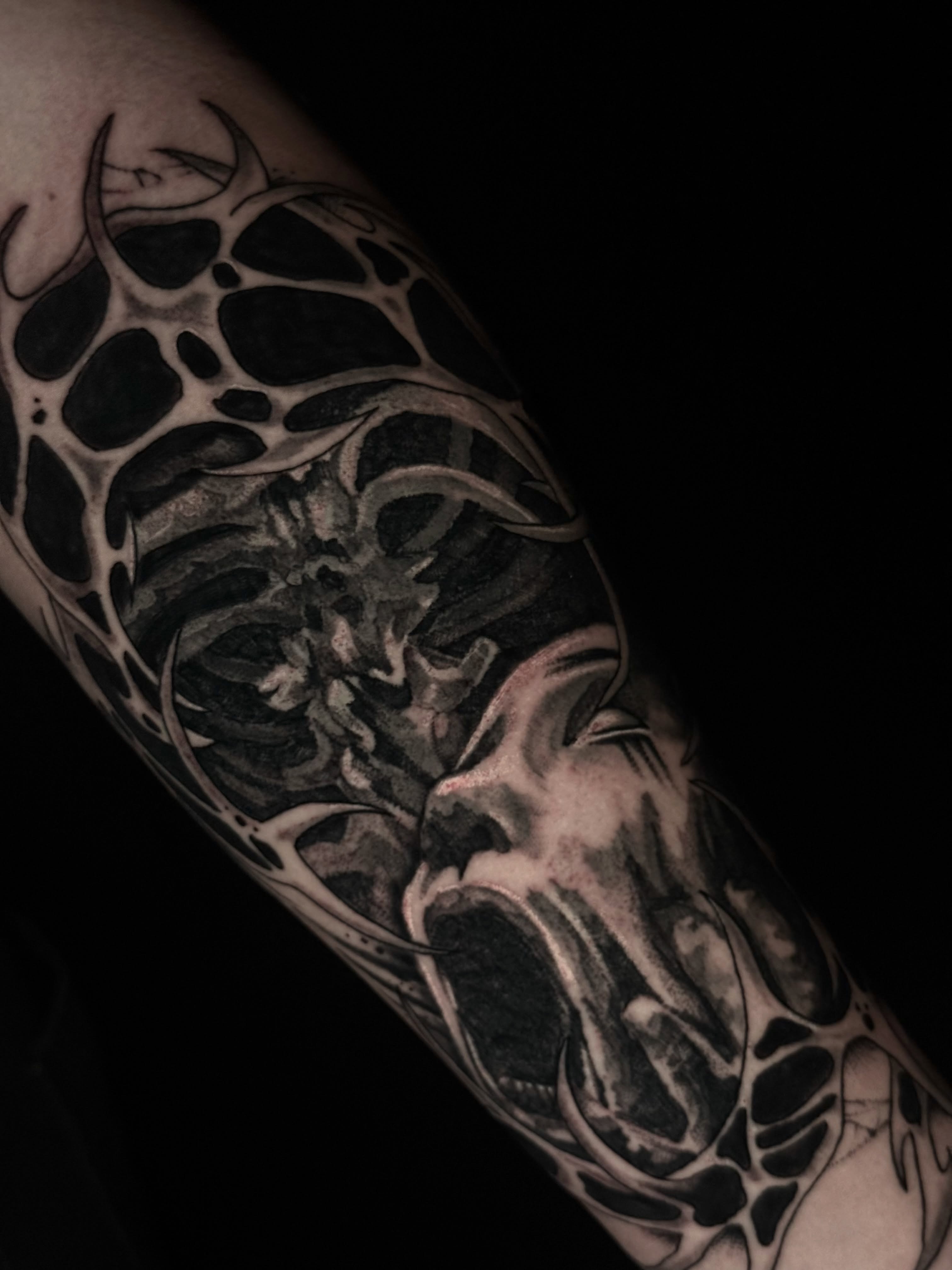 Bone structure black and grey tattoo on the forearm by Exploitedtattoos