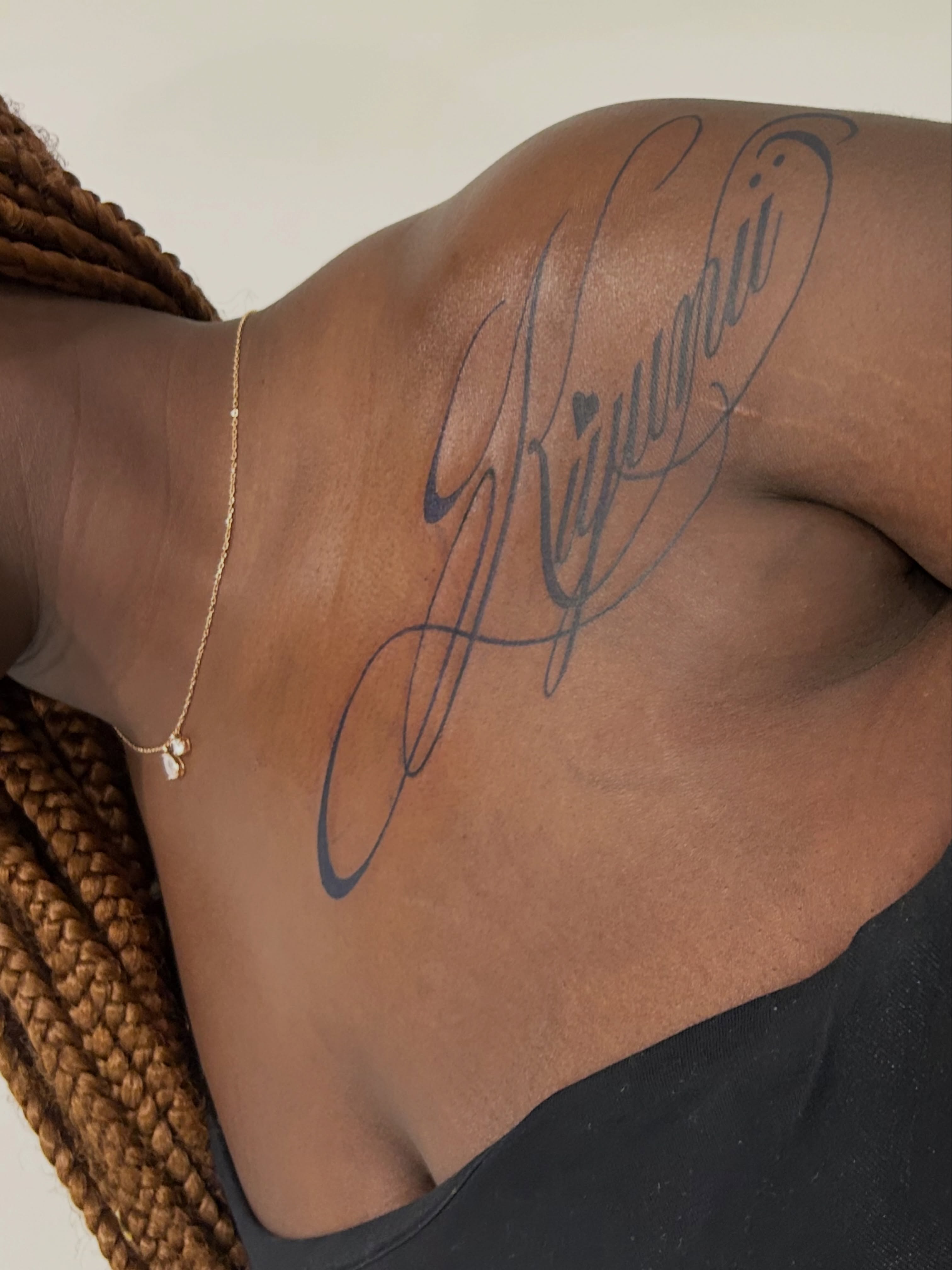 Script lettering lettering script tattoo on the back by Miss Moezartt the Multidisciplinary