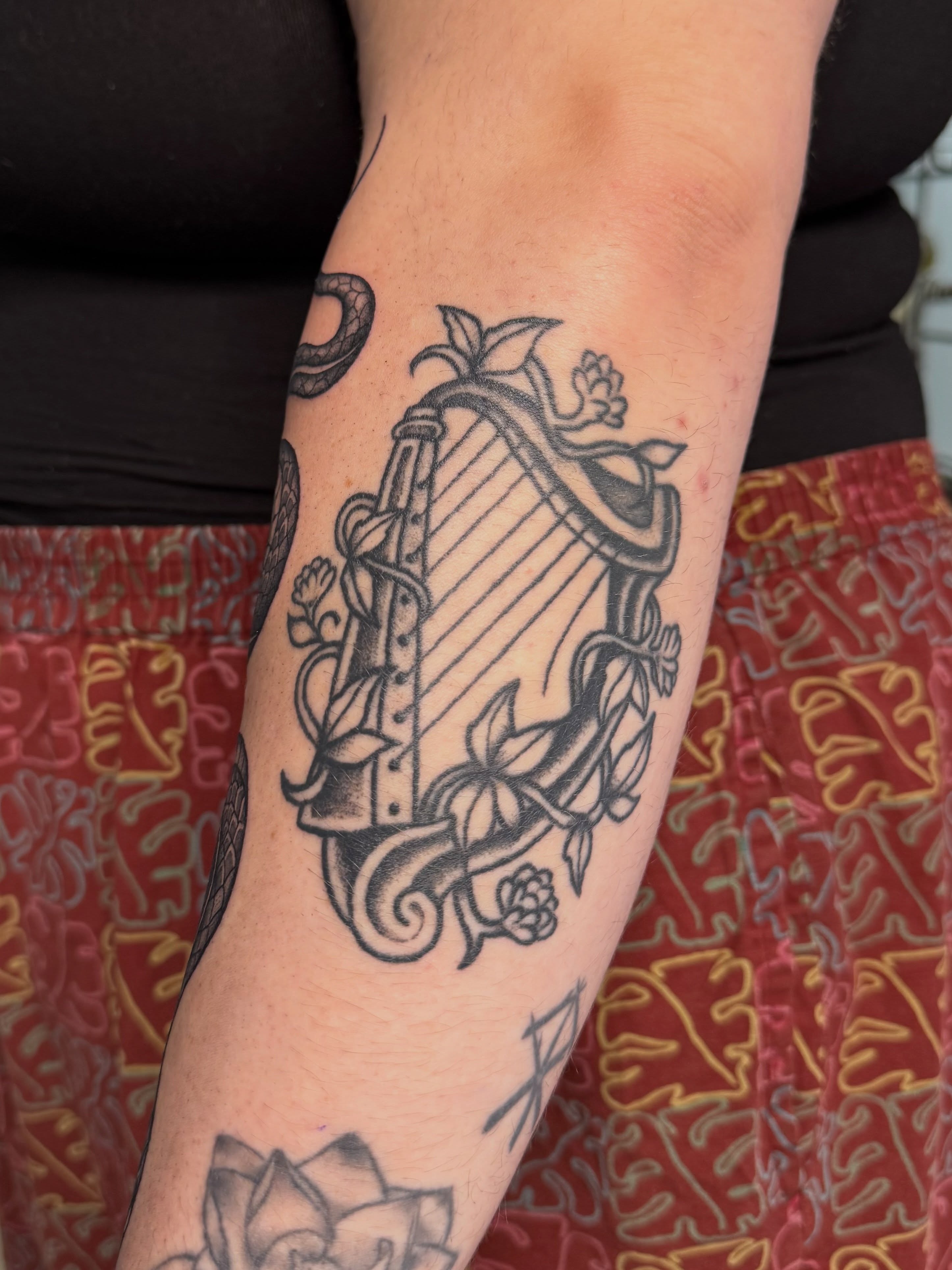 Tattoo by @erica_tats — black_and_grey