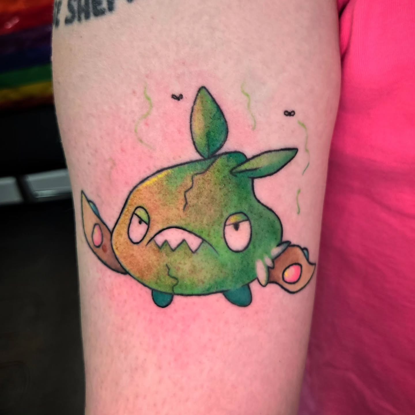 Angry plant watercolor tattoo on the forearm by Meghan Hounsell