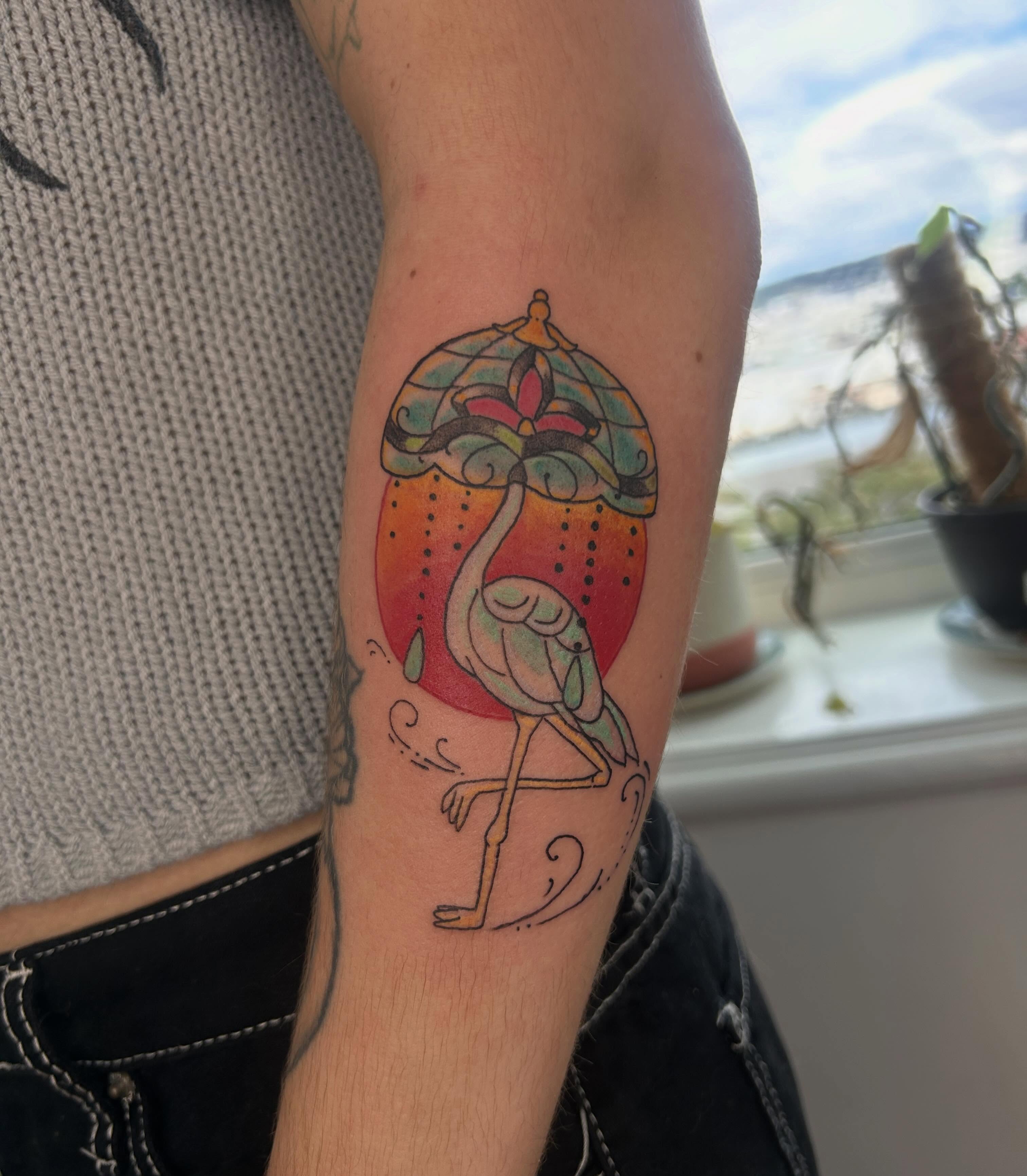 Flamingo in stained glass dotwork tattoo on the forearm by Reilley Earles