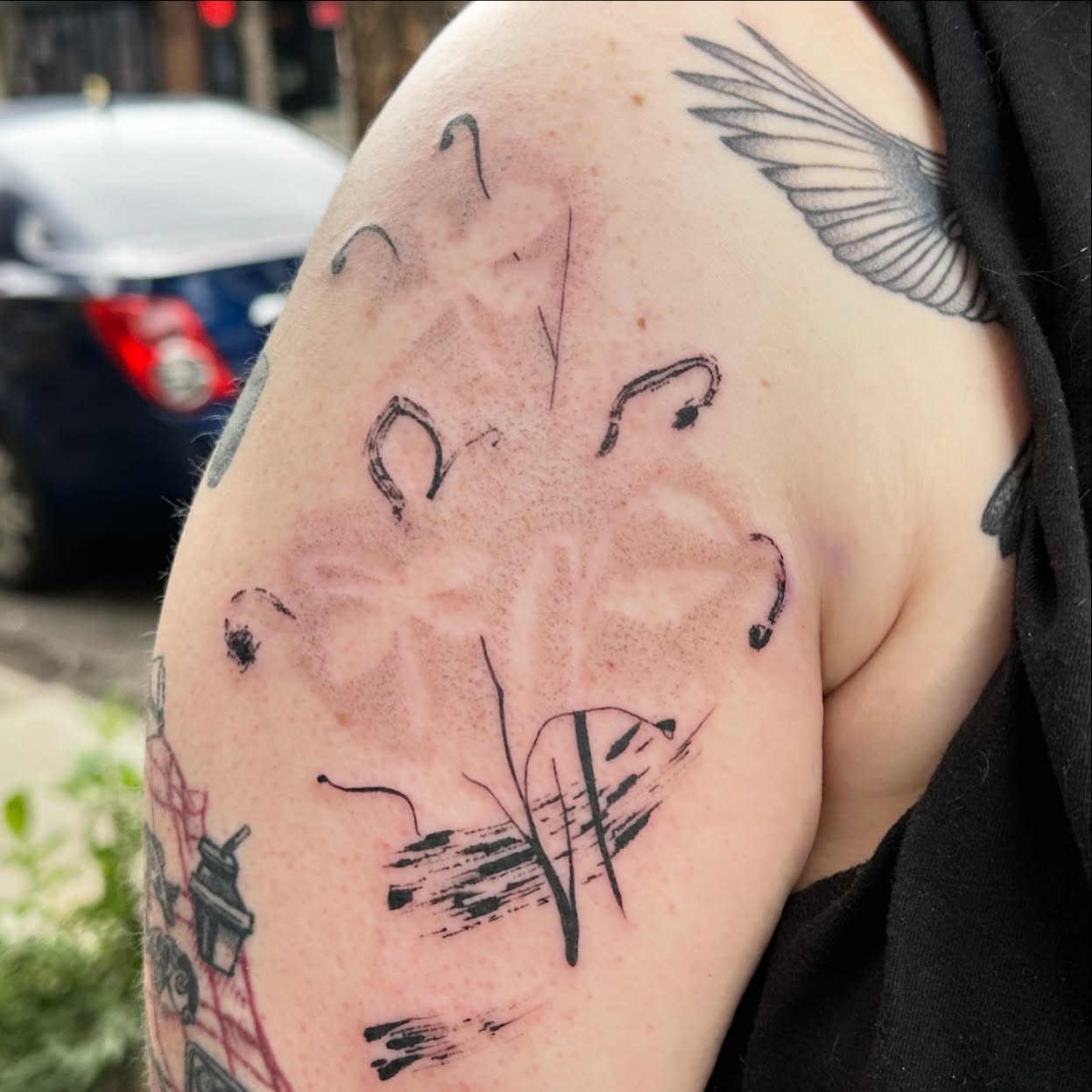 Abstract shapes black and grey tattoo on the shoulder by reid - tattoo artist
