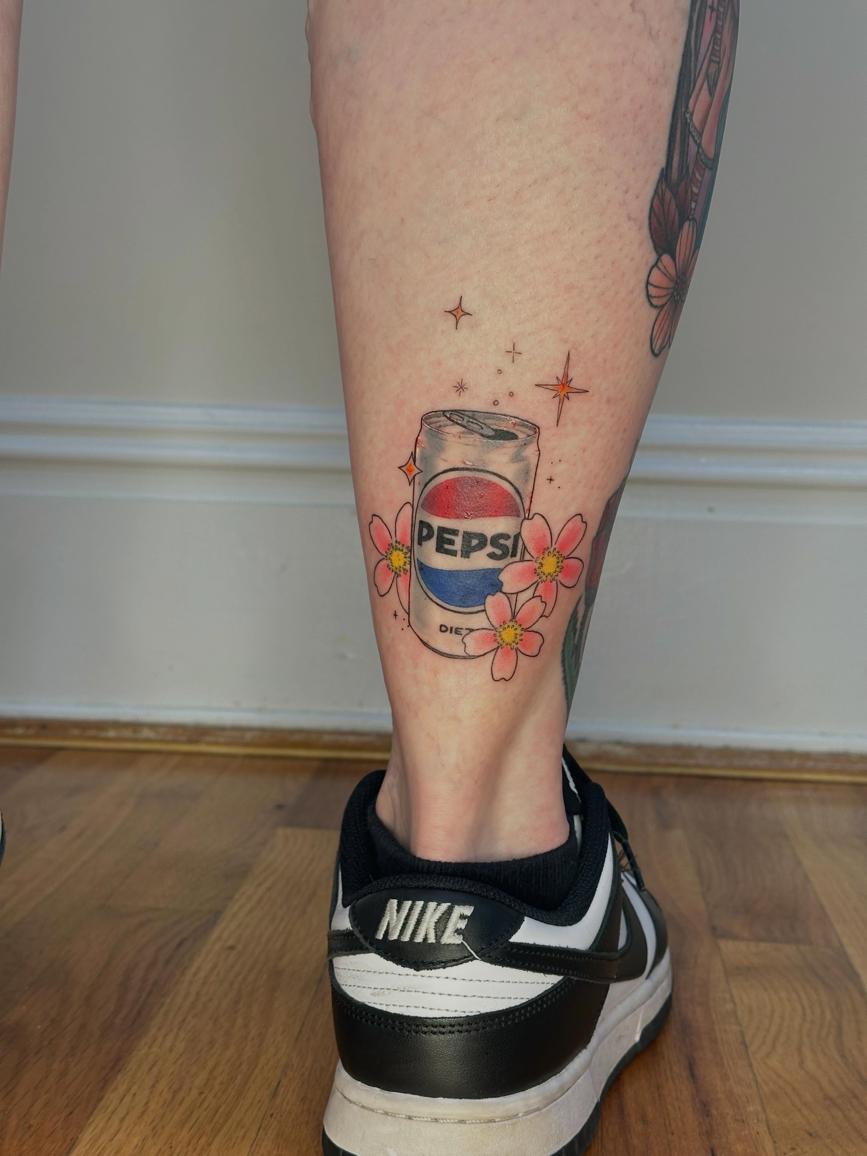 Diet pepsi can American traditional tattoo on the calf by Micha Sol