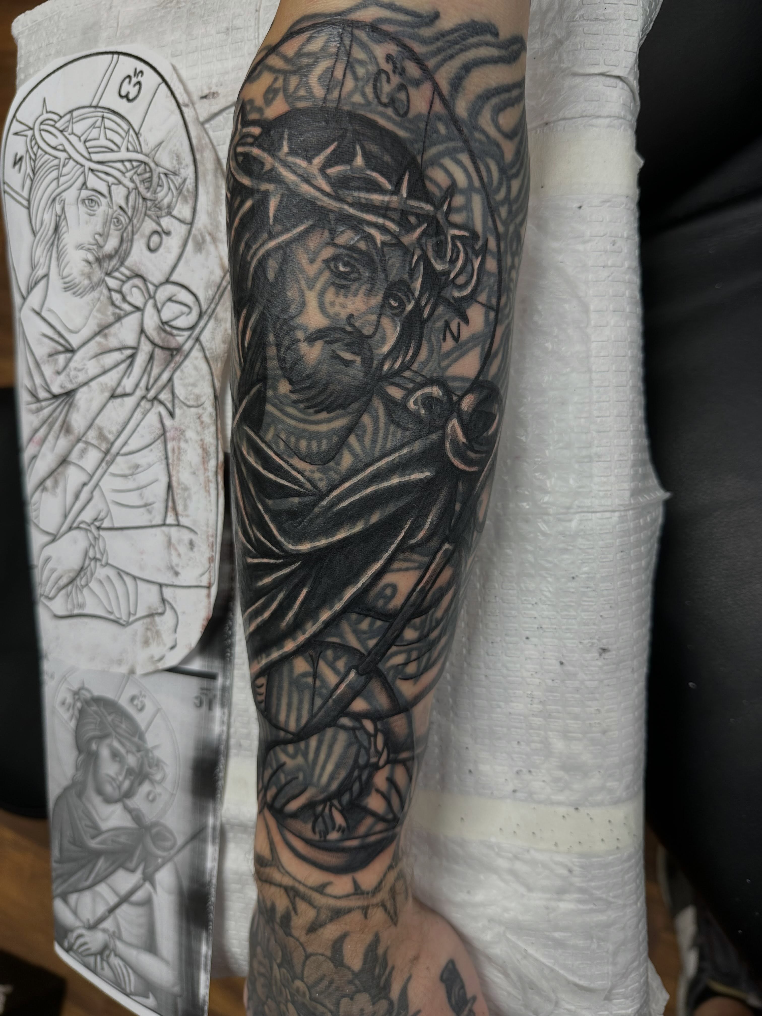 Religious figure realism tattoo on the forearm by Vincent Merys