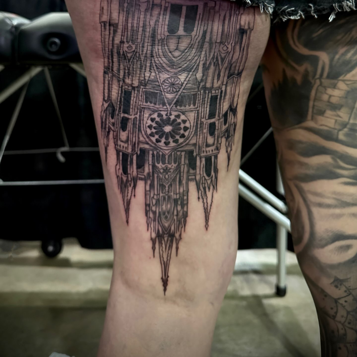 Gothic cathedral geometric tattoo on the leg by Mika'la Berry