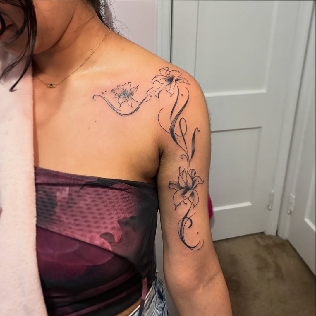 Lily flowers black and grey tattoo on the shoulder by ๐ต๐๐๐๐๐๐๐ ๐ป๐๐๐๐