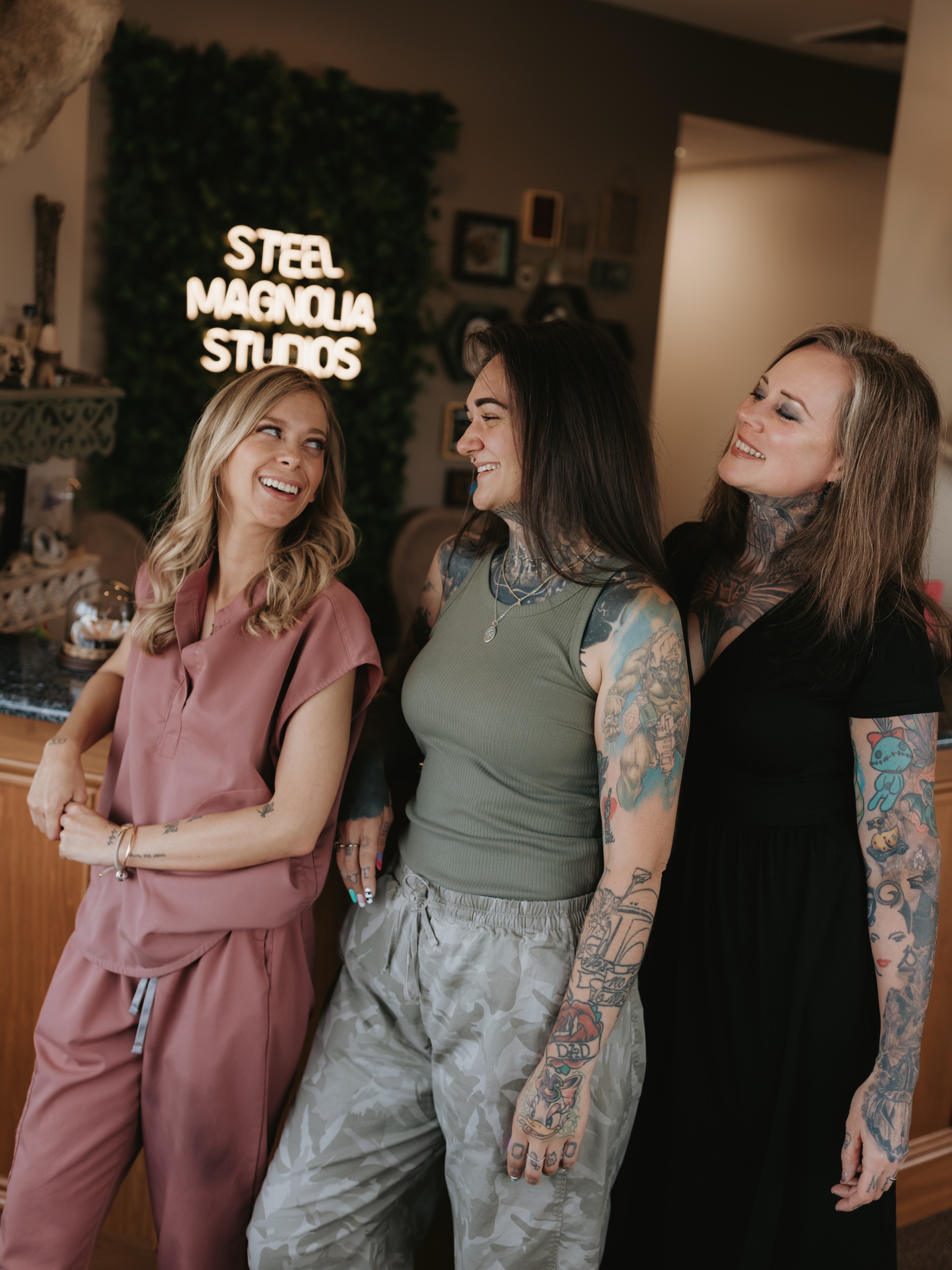 Tattooed arms American traditional tattoo on the upper arm by Shelby Raia