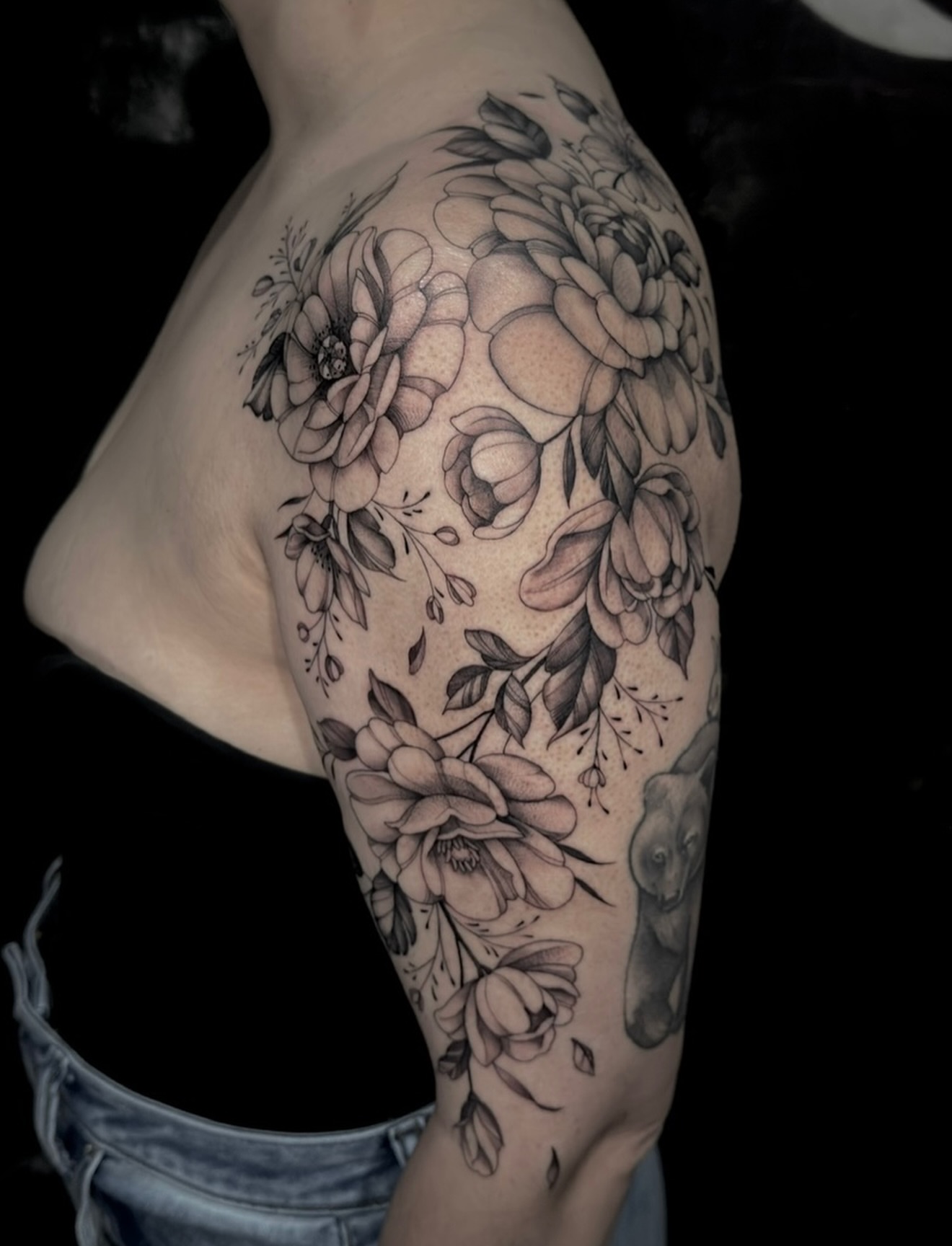 Floral bouquet black and grey tattoo on the shoulder by Mel K Lockett - Nashville Tattoo Artist