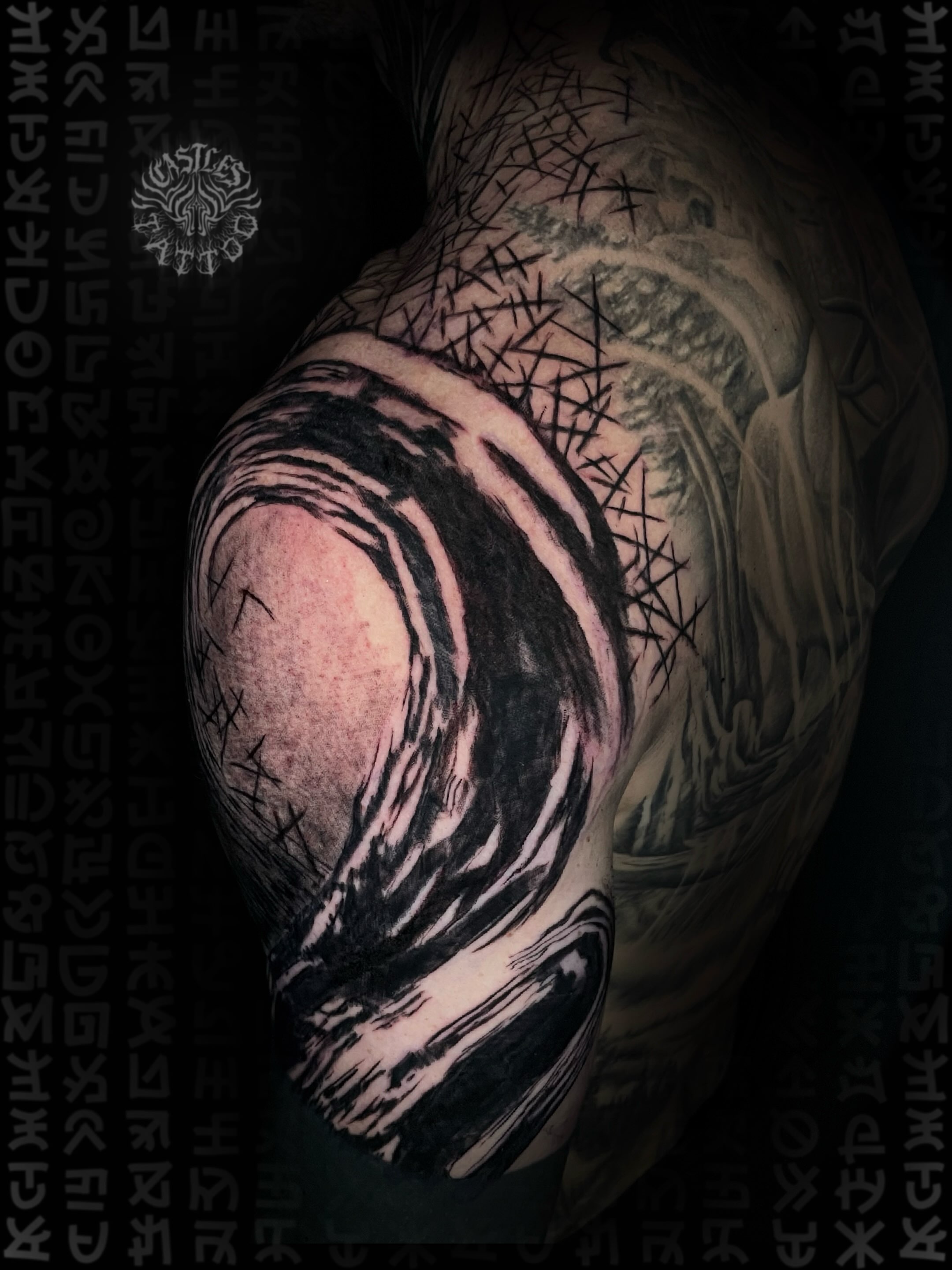 Wave black and grey tattoo on the shoulder by Erin Portland Tattoo Artist