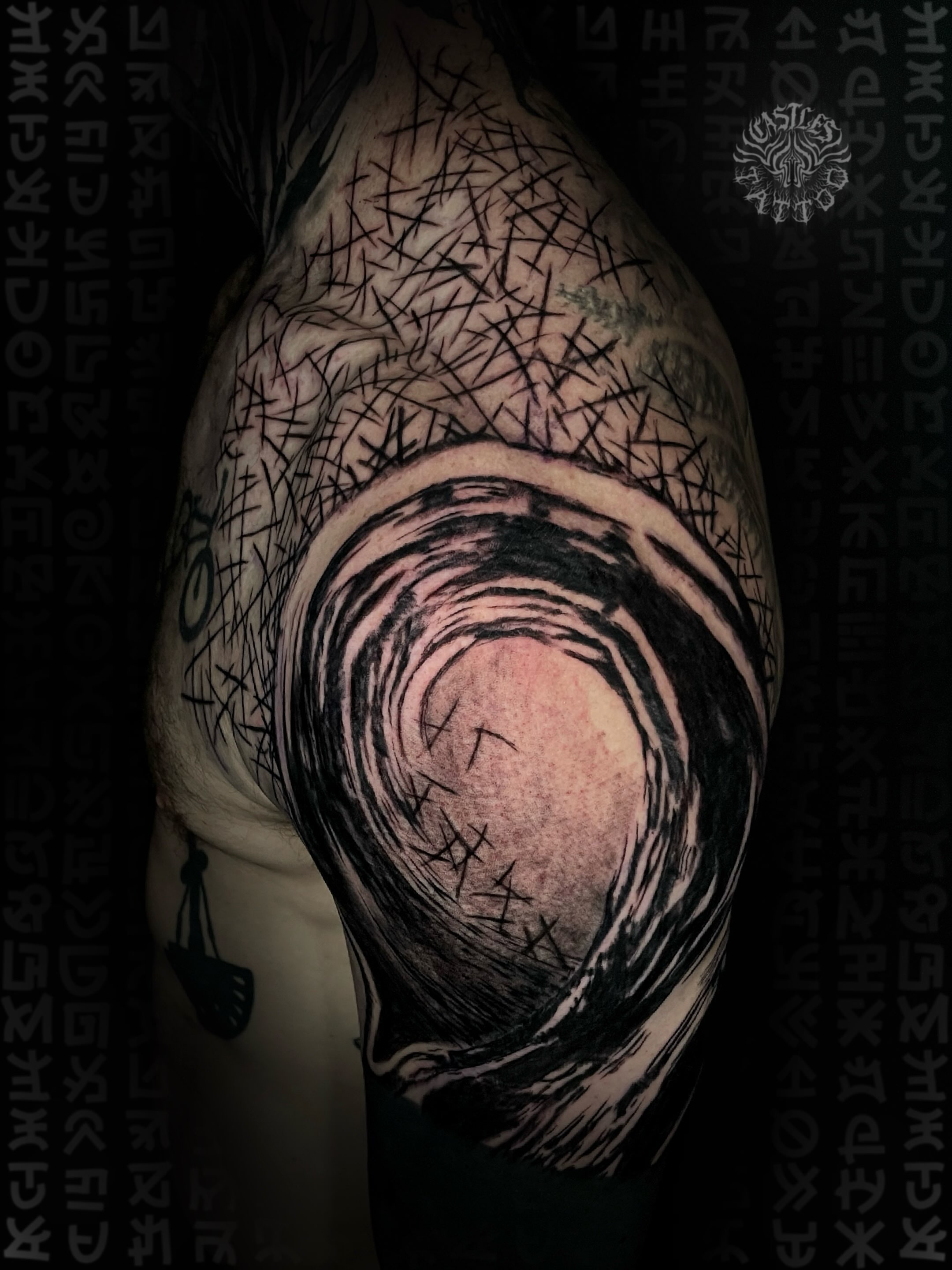 Eye black and grey tattoo on the shoulder by Erin Portland Tattoo Artist