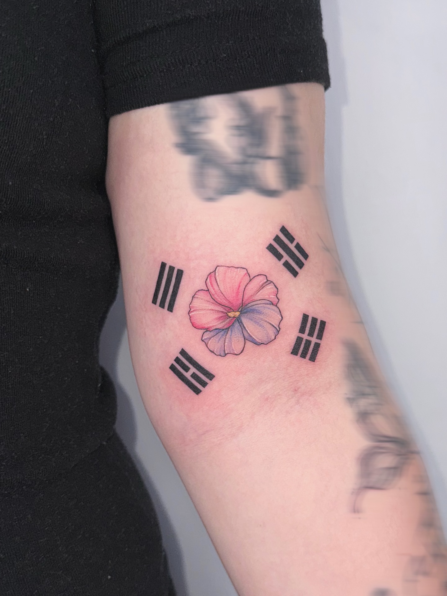 Tattoo by @a.won_tattoo — watercolor, geometric