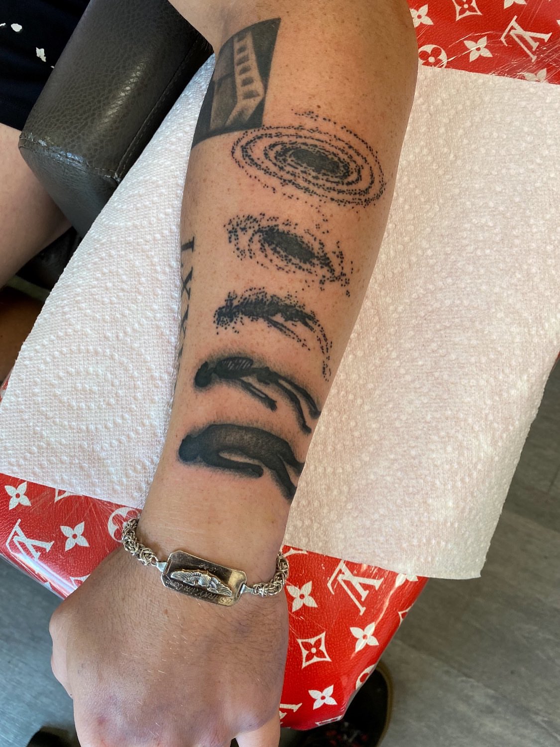 Abstract patterns dotwork tattoo on the forearm by Kelan Mckenna