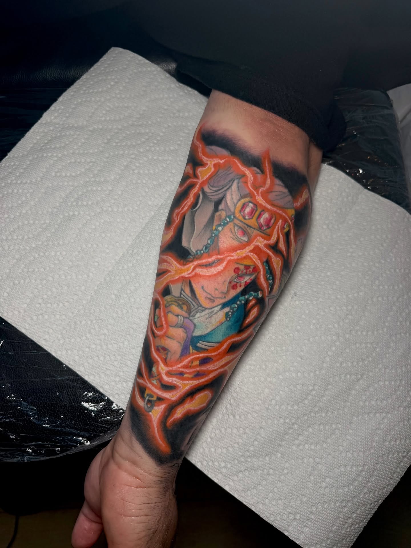 Anime character anime tattoo on the forearm by Lyndze Masters