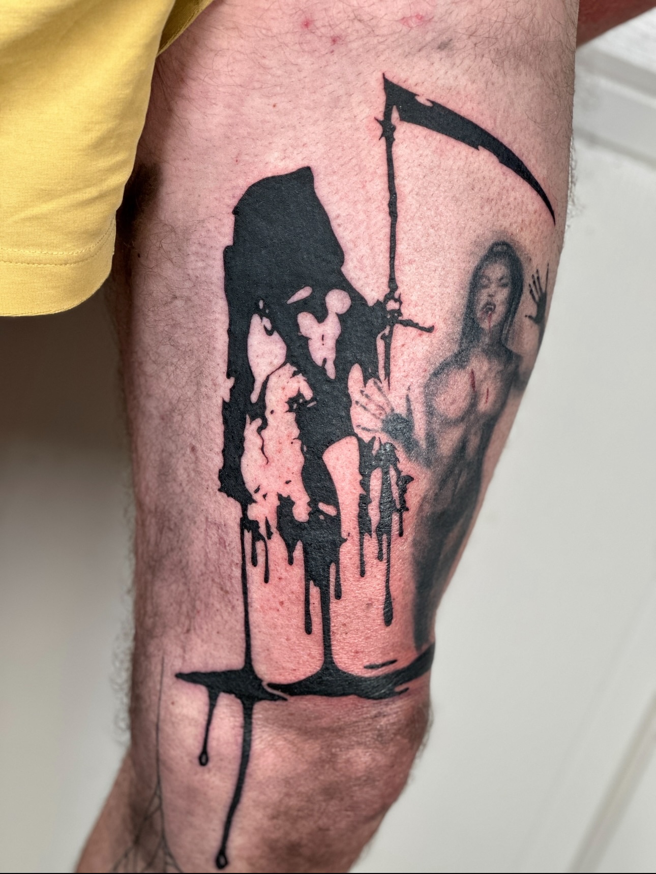 Grim reaper and woman black and grey tattoo on the thigh by Nashville Tattoo Artist - Nicolette Madlyne