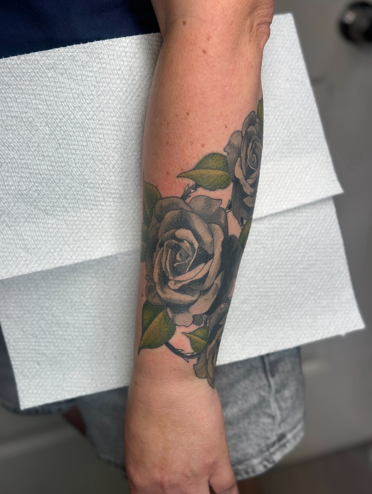 Roses black and grey tattoo on the forearm by Nashville Tattoo Artist - Nicolette Madlyne