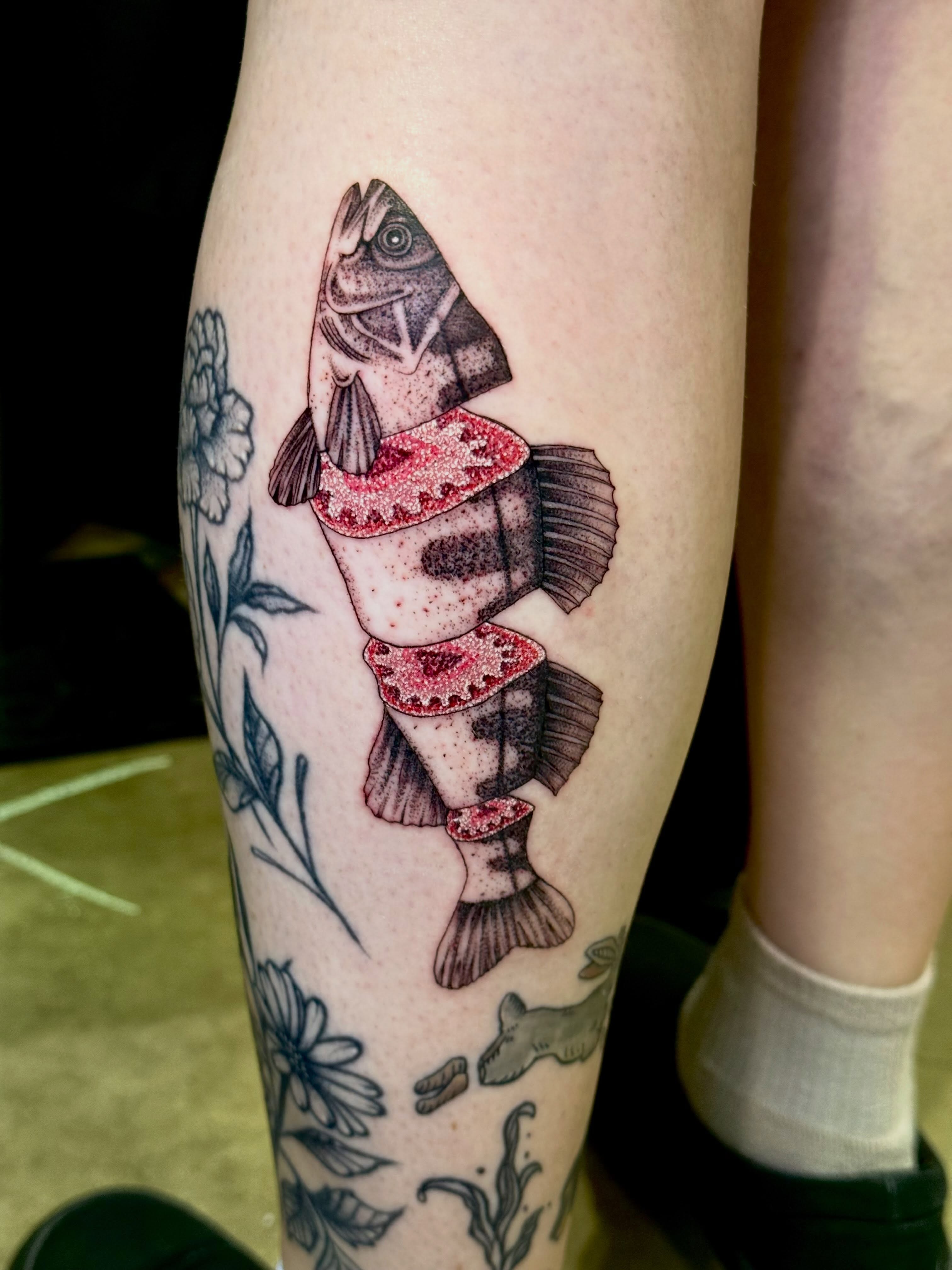Striped fish realism tattoo on the forearm by Max