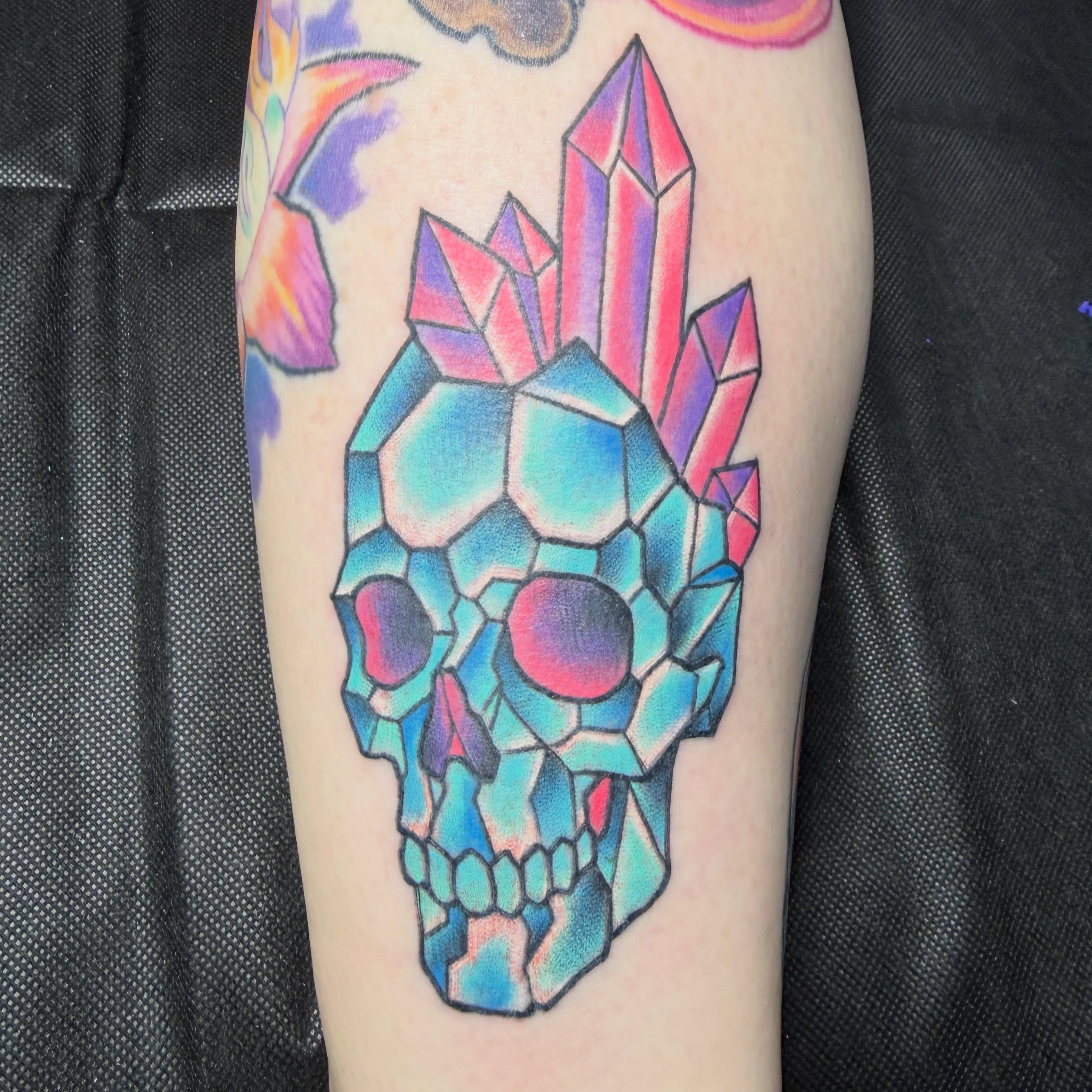 Geometric skull geometric tattoo on the forearm by Durb