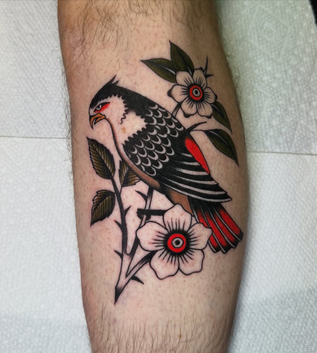 Bird and flowers American traditional tattoo on the forearm by Allie Barringer