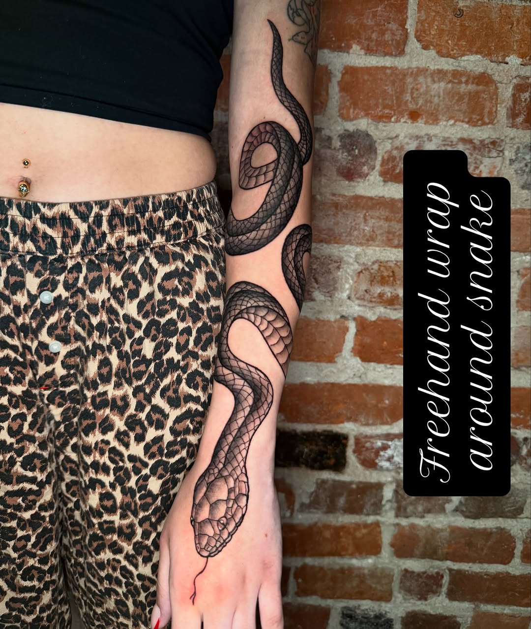 Snake realism tattoo on the upper arm by CAT