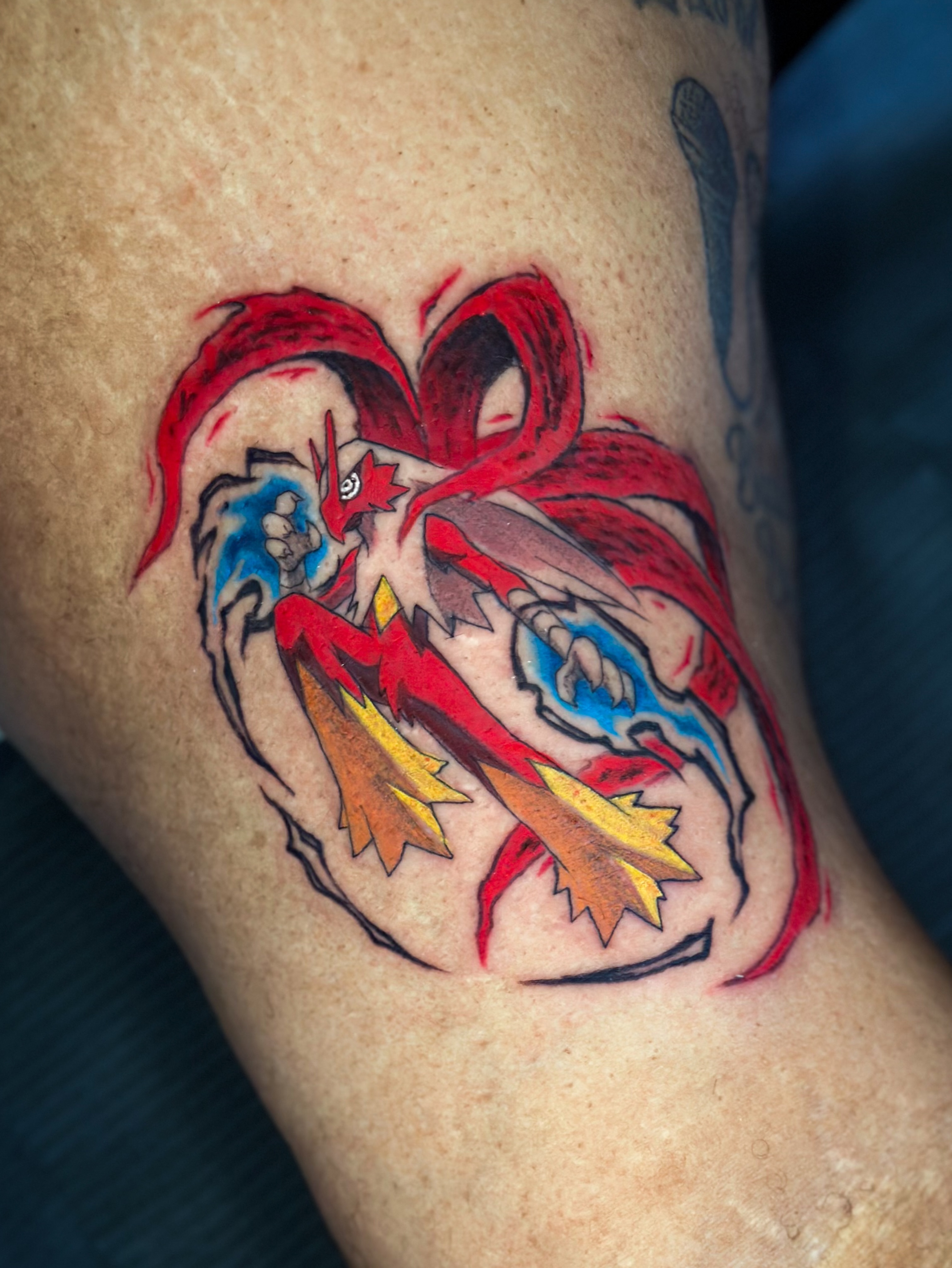 Heart with phoenix new school tattoo on the thigh by Jesús Blones - Tattoo Artist, Norwalk, Connecticut