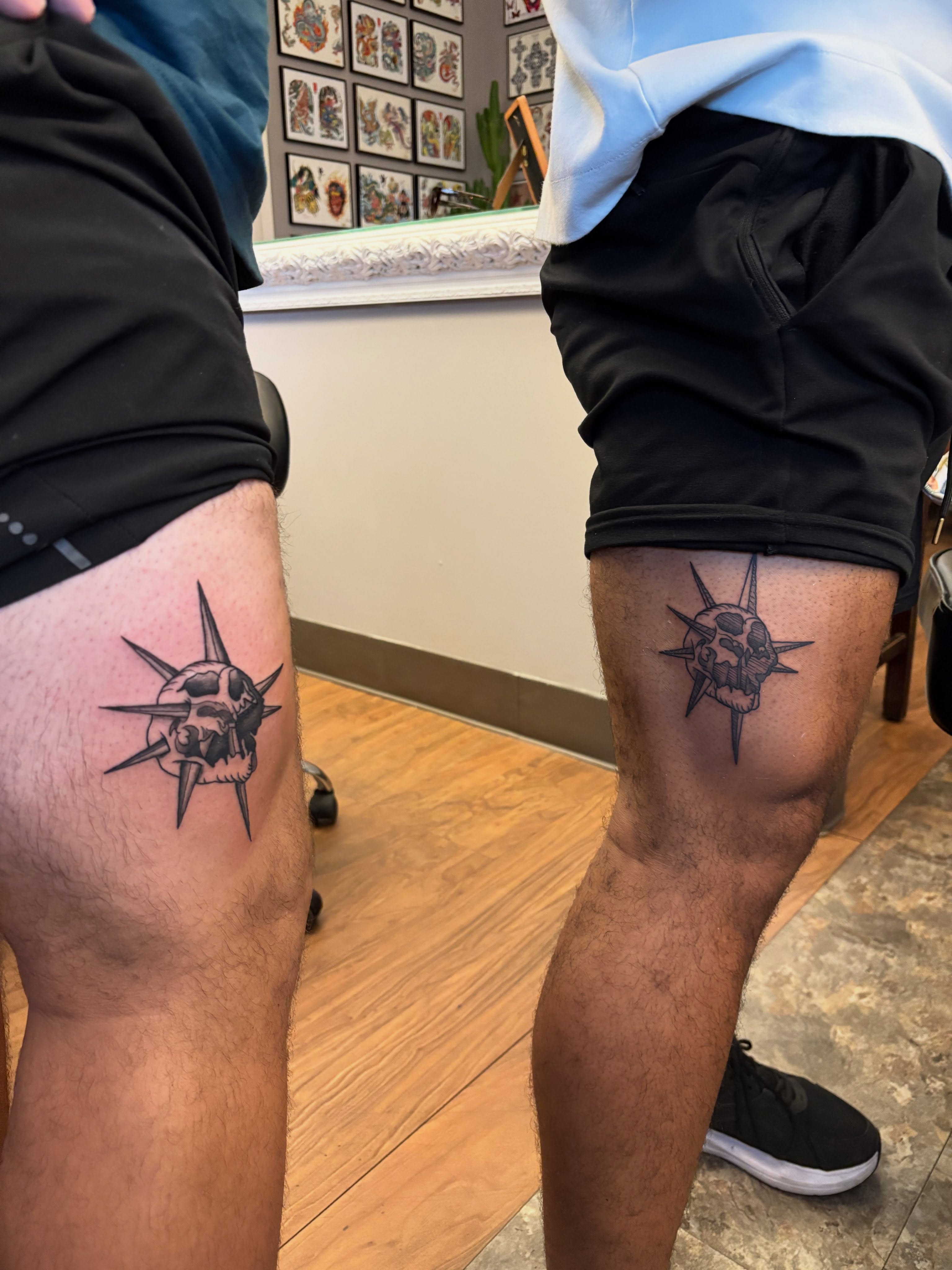 Compass skull black and grey tattoo on the thigh by Luke