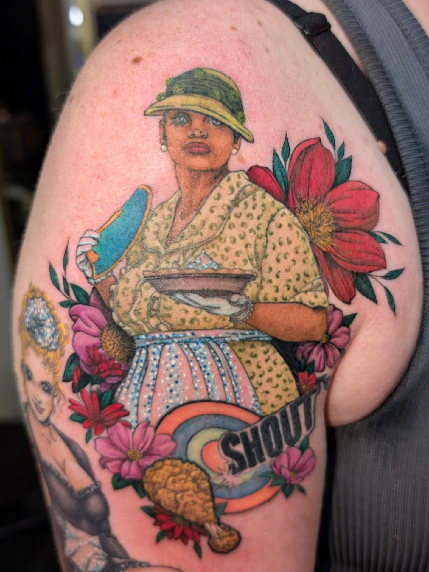 Woman with flowers American traditional tattoo on the shoulder by Jessica Thomas Fleischman, Morganton, North Carolina