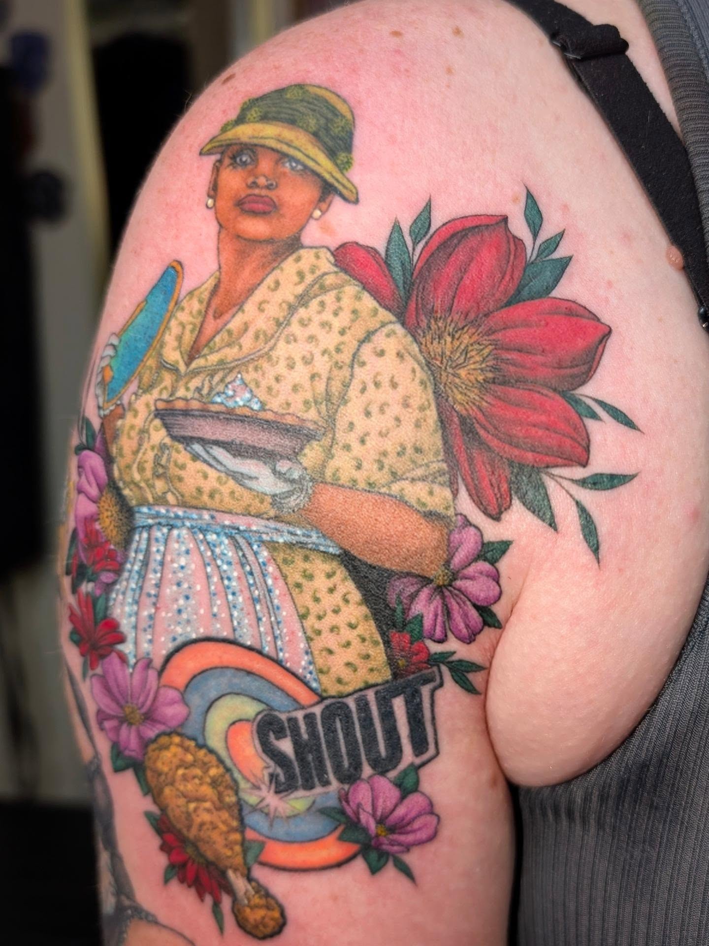 Housewife with sunflower American traditional tattoo on the shoulder by Jessica Thomas Fleischman, Morganton, North Carolina