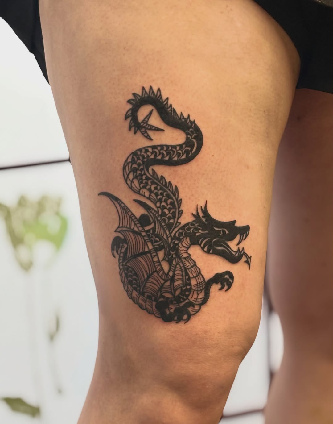 Dragon realism tattoo on the thigh by CJ