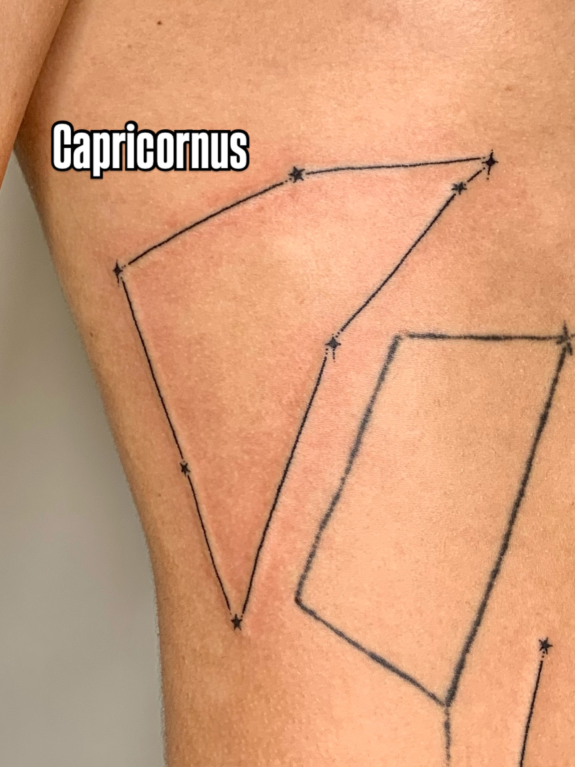 Constellation geometric tattoo on the thigh by Lex Lloyd