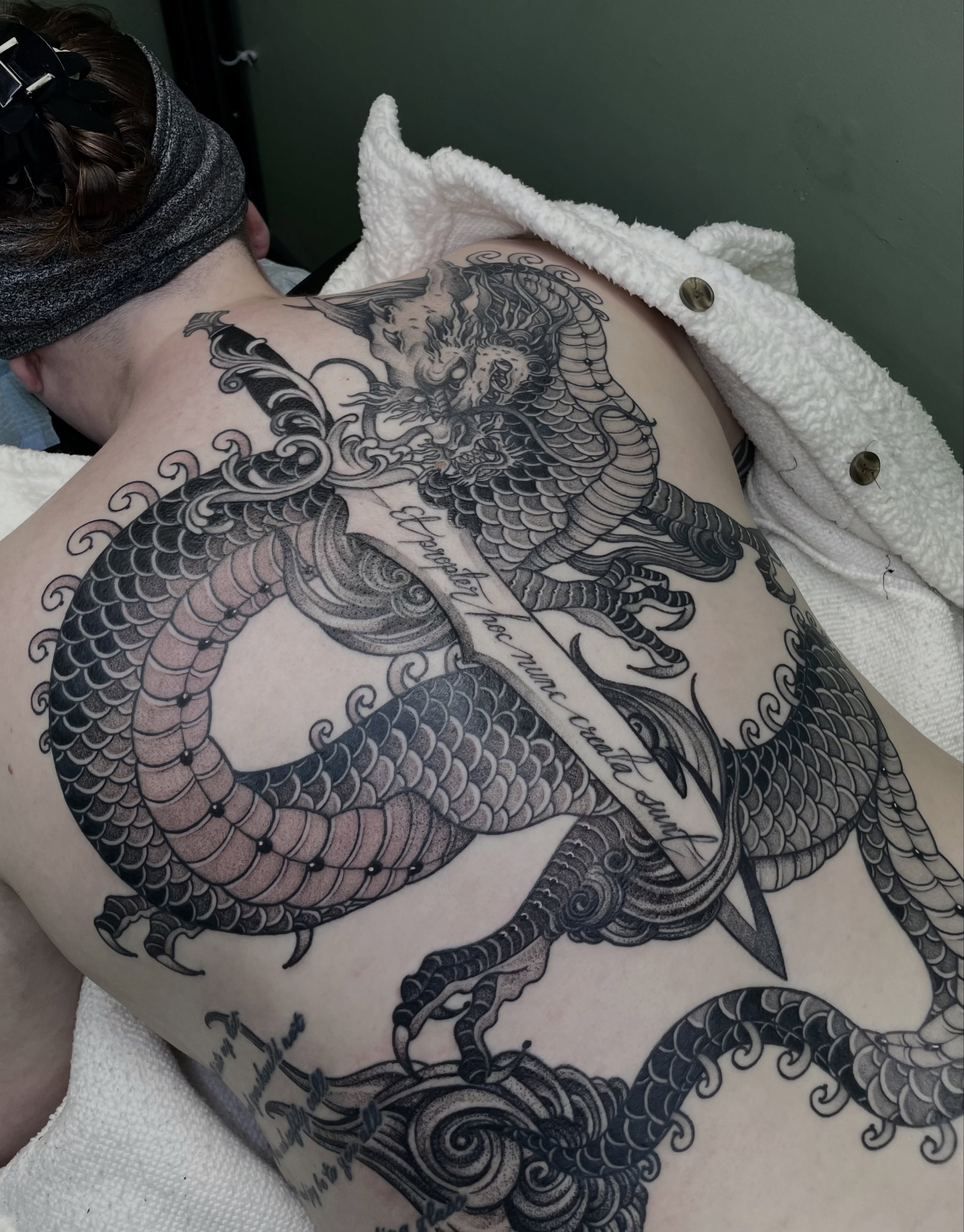 Dragon black and grey tattoo on the back by Jena Perry