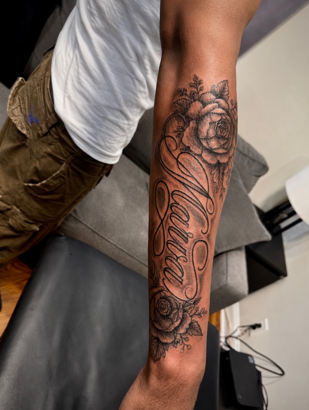 Name with roses lettering tattoo on the forearm by JayyeSosa