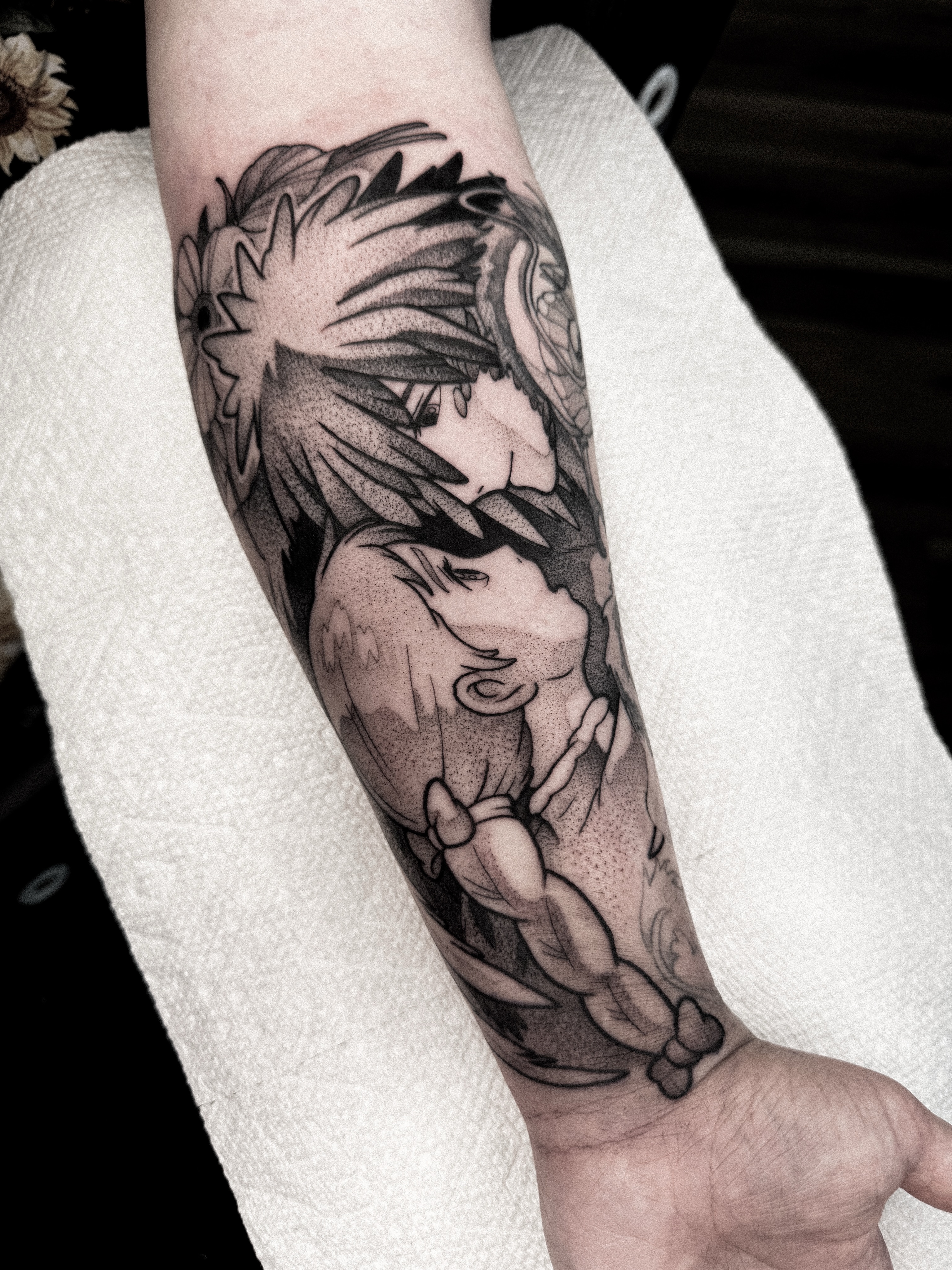 Anime character dotwork tattoo on the forearm by Dane Bezeau