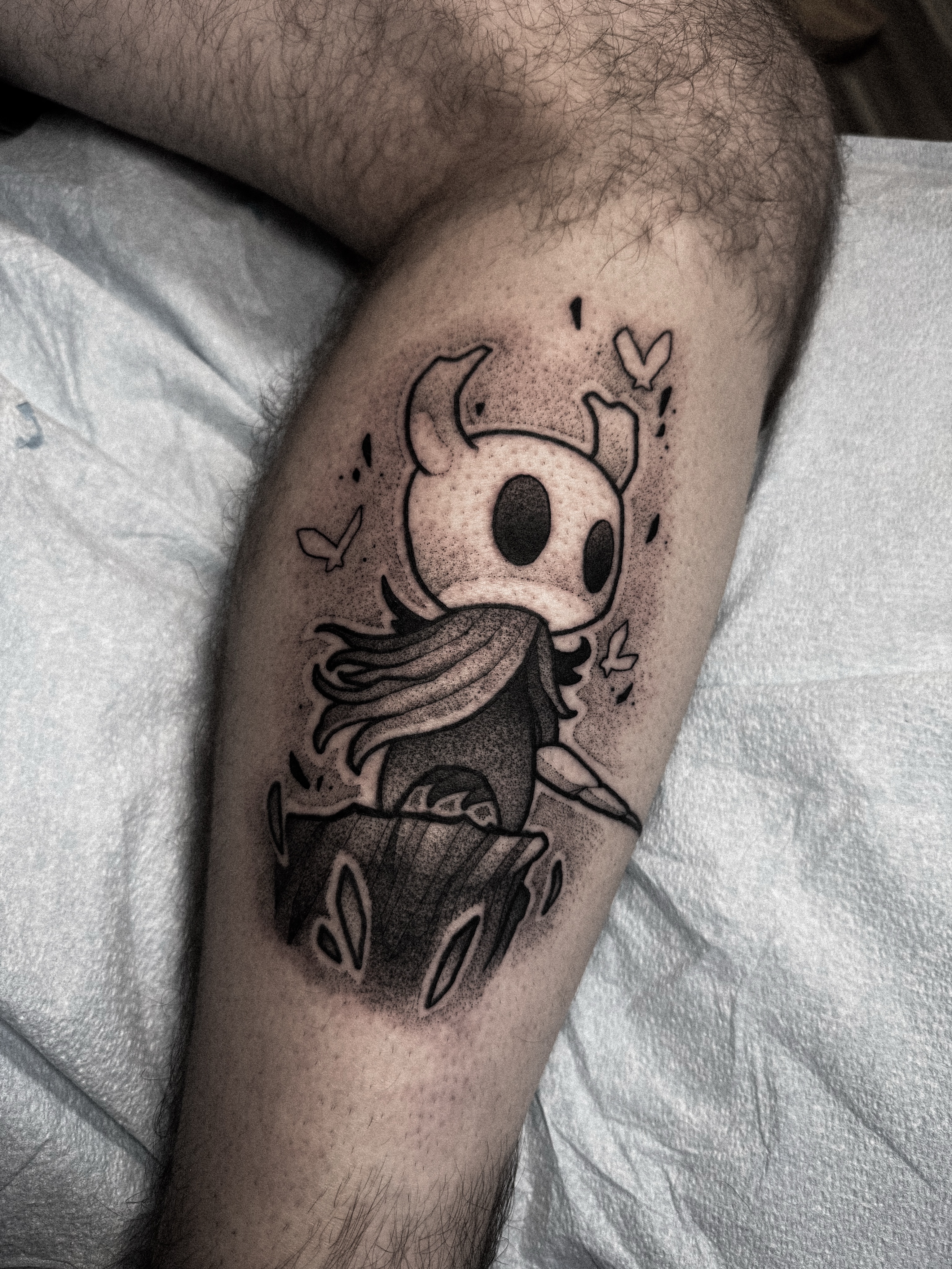 Hollow knight dotwork tattoo on the thigh by Dane Bezeau