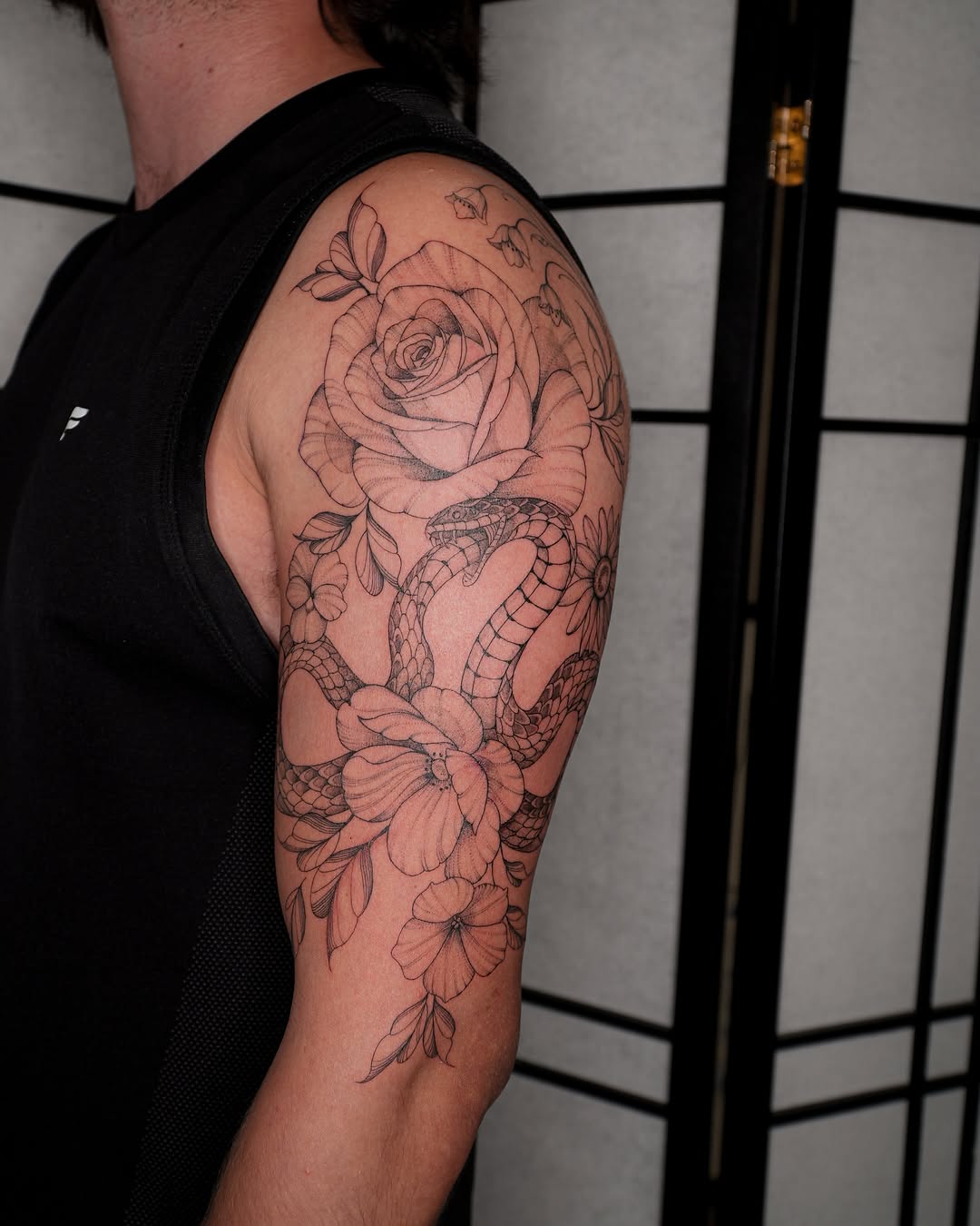 Snake and rose realism tattoo on the upper arm by Pandora ✨ Floral, Los Angeles, California