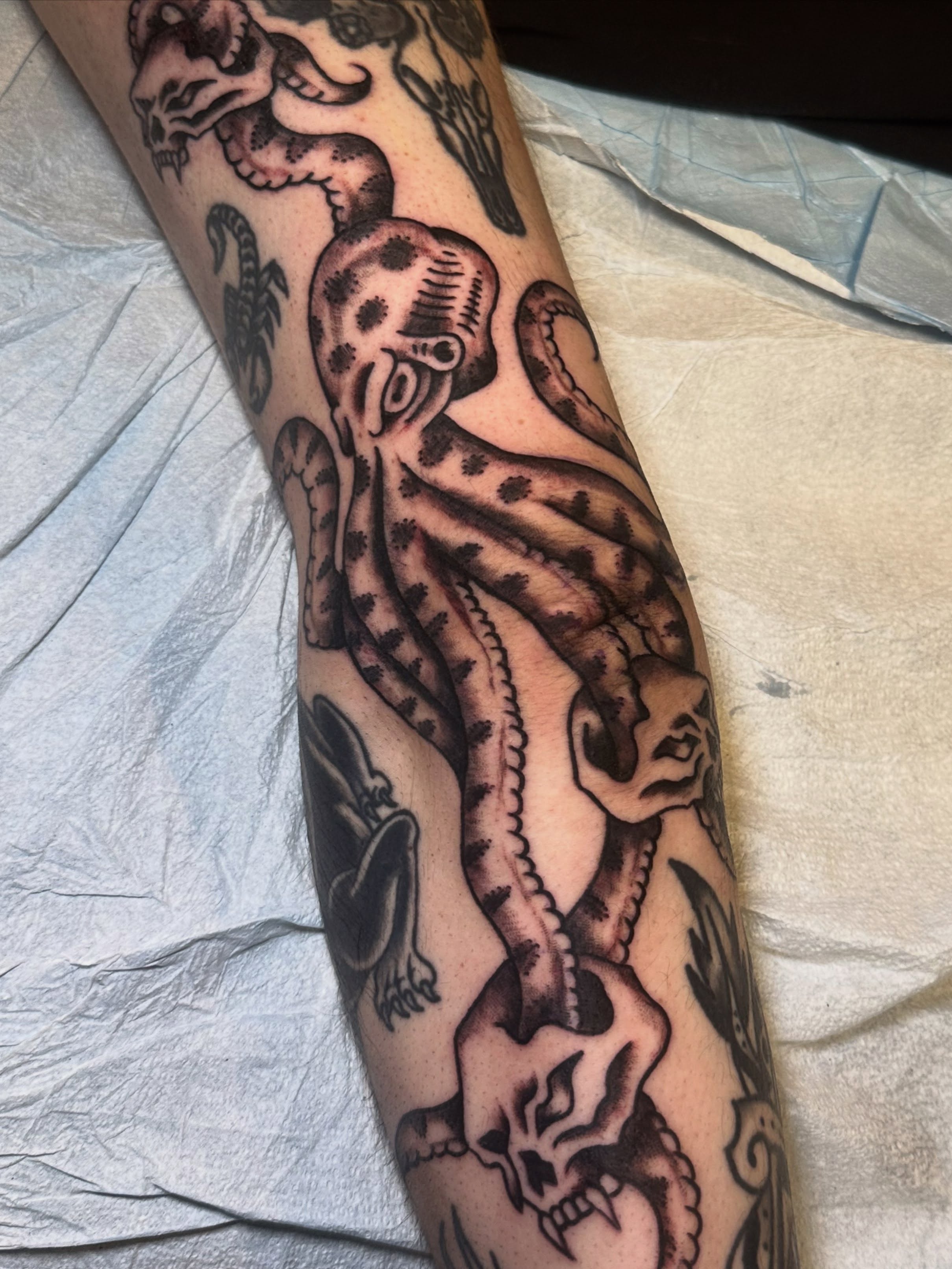 Octopus American traditional tattoo on the forearm by ࿊ Emma Sloan Tattoos ࿊, Austin, Texas