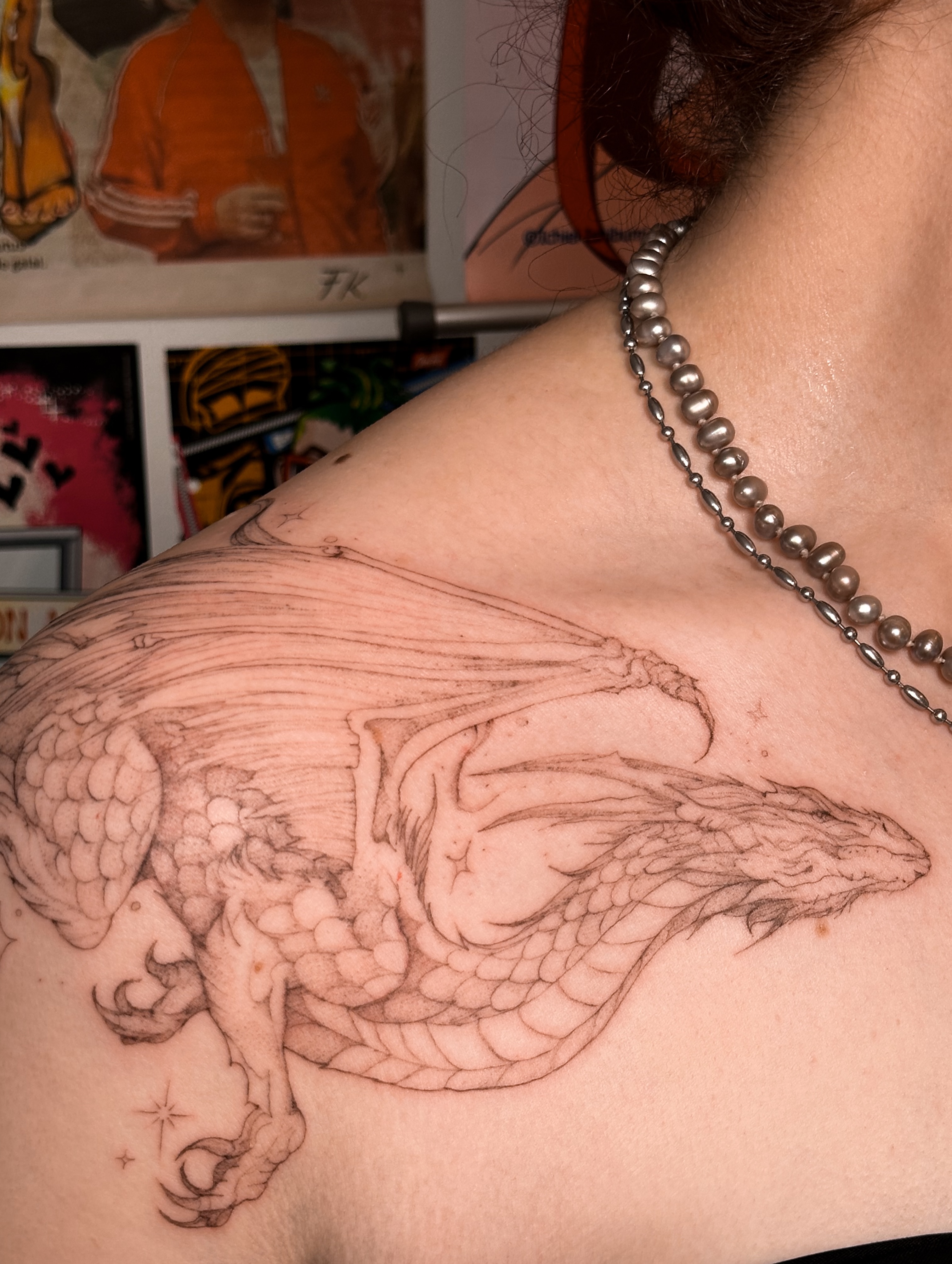 Dragon black and grey tattoo on the shoulder by Mila, Riga, Latvia