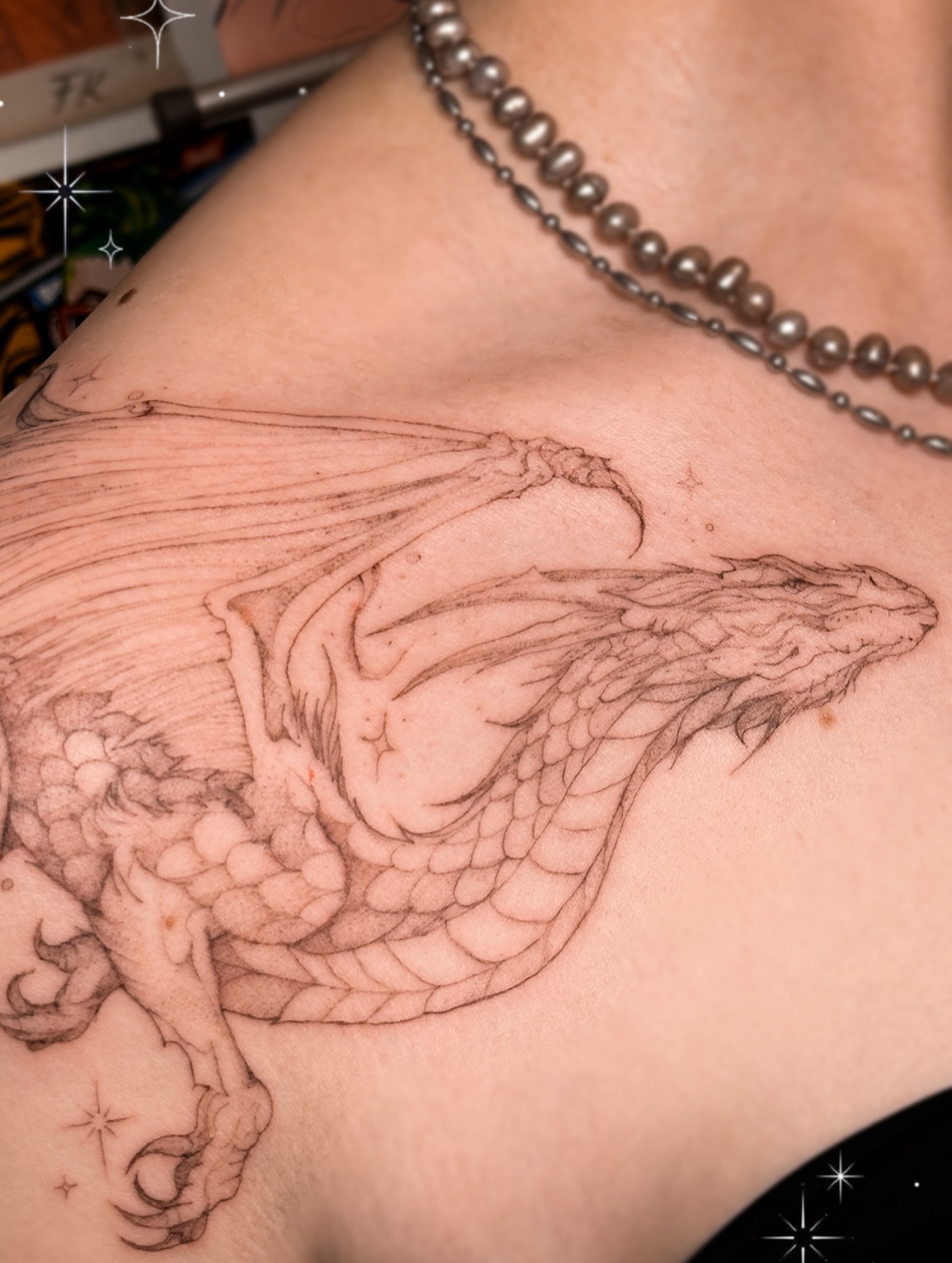 Dragon realism tattoo on the shoulder by Mila, Riga, Latvia