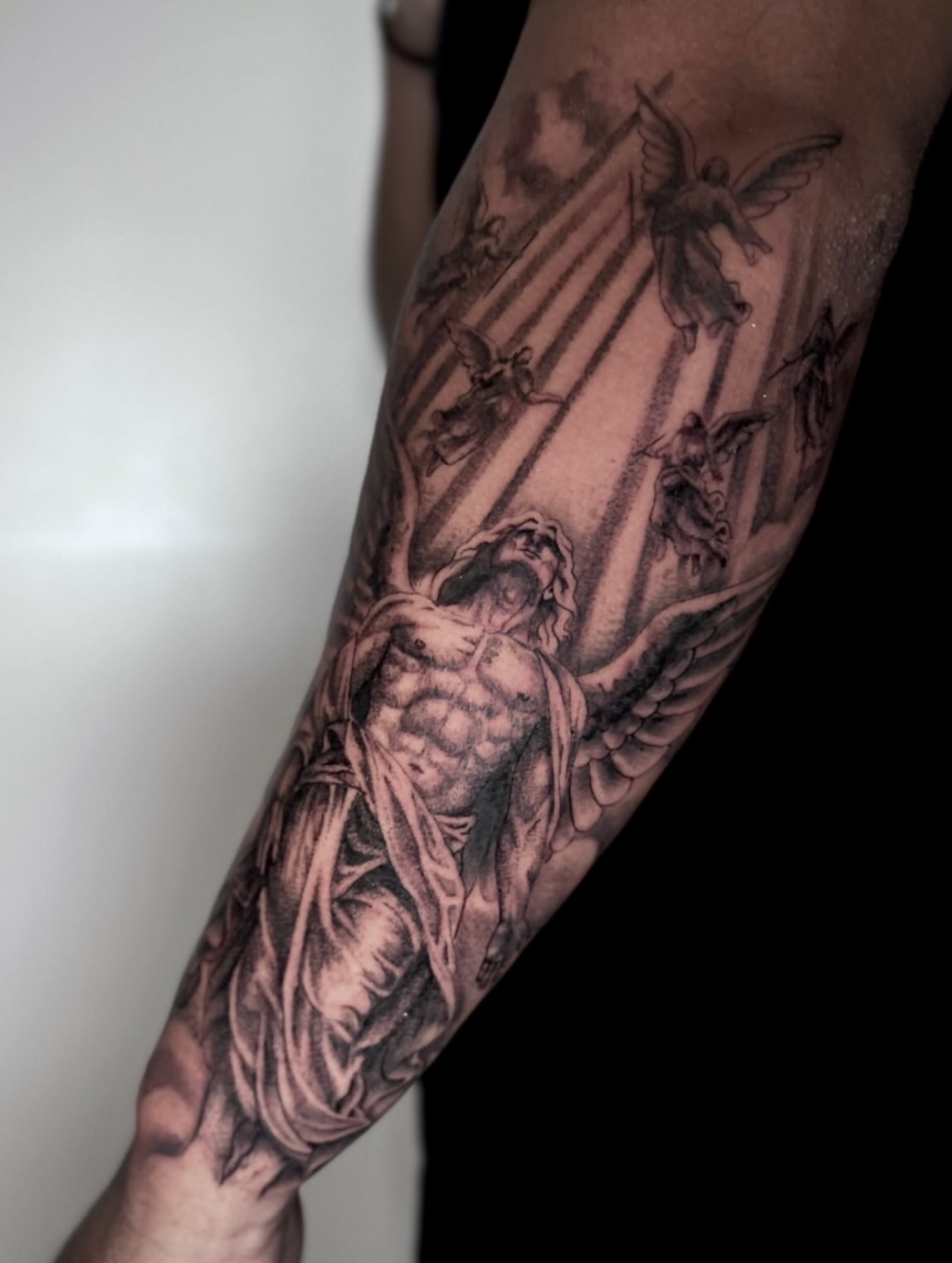 Angelic figure realism tattoo on the forearm by ππππππ ππππππ - ππππ‘ππ₯ ππ¨π₯π’πππ«π’π¨π¬ π΅π