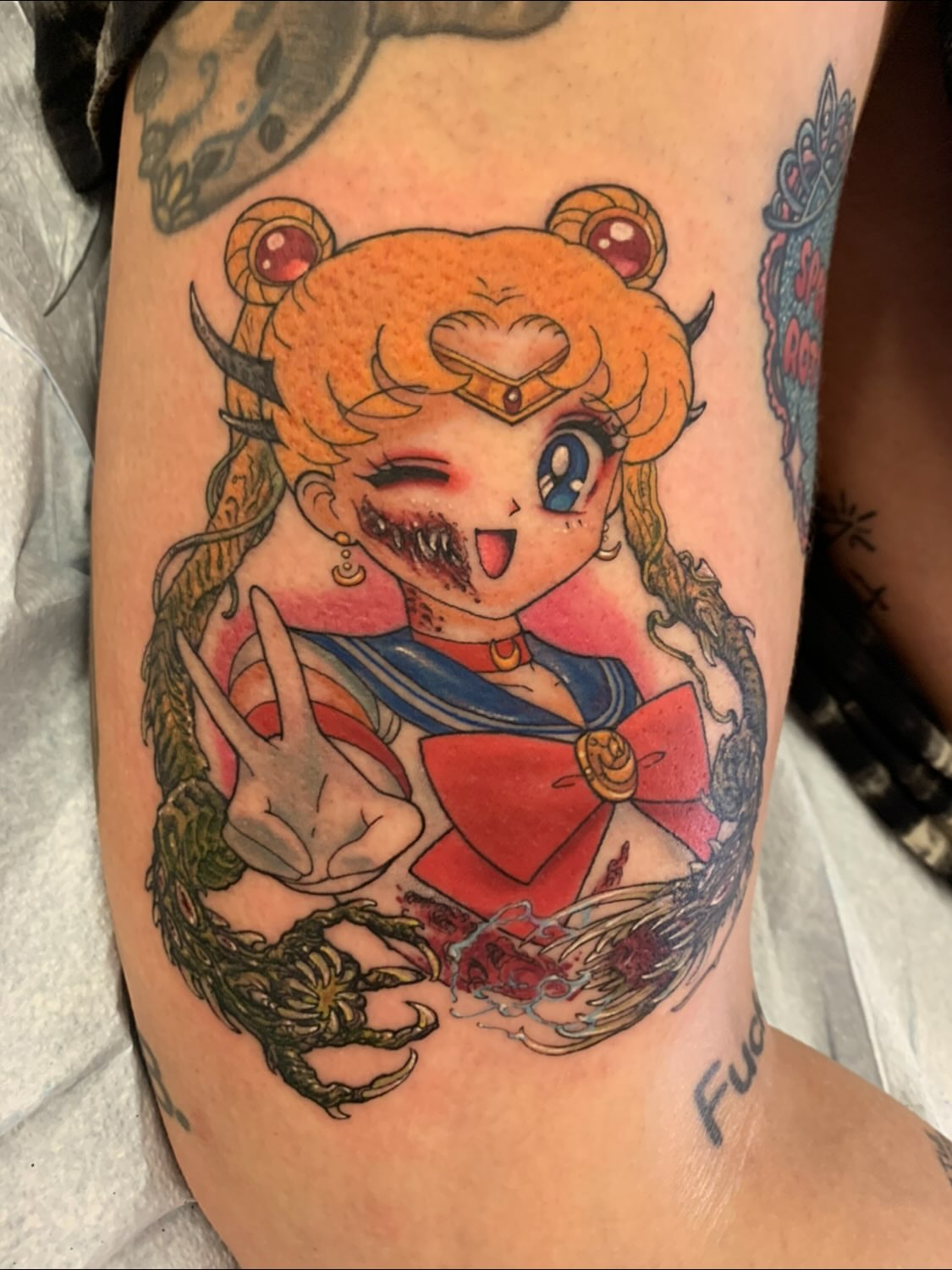 Sailor moon anime tattoo on the thigh by Nathan Esteras