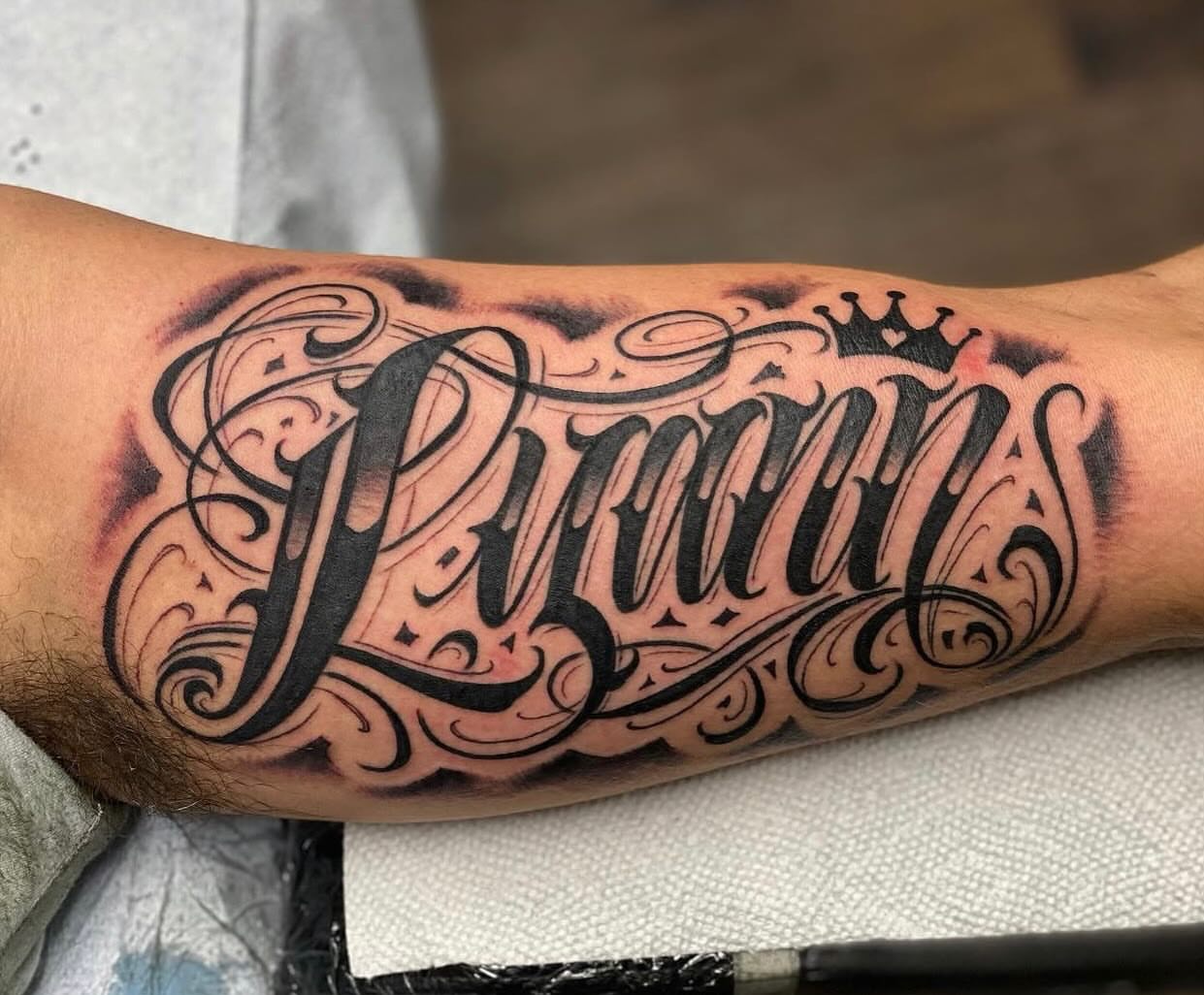 Script lettering lettering script tattoo on the forearm by Lex Miranda