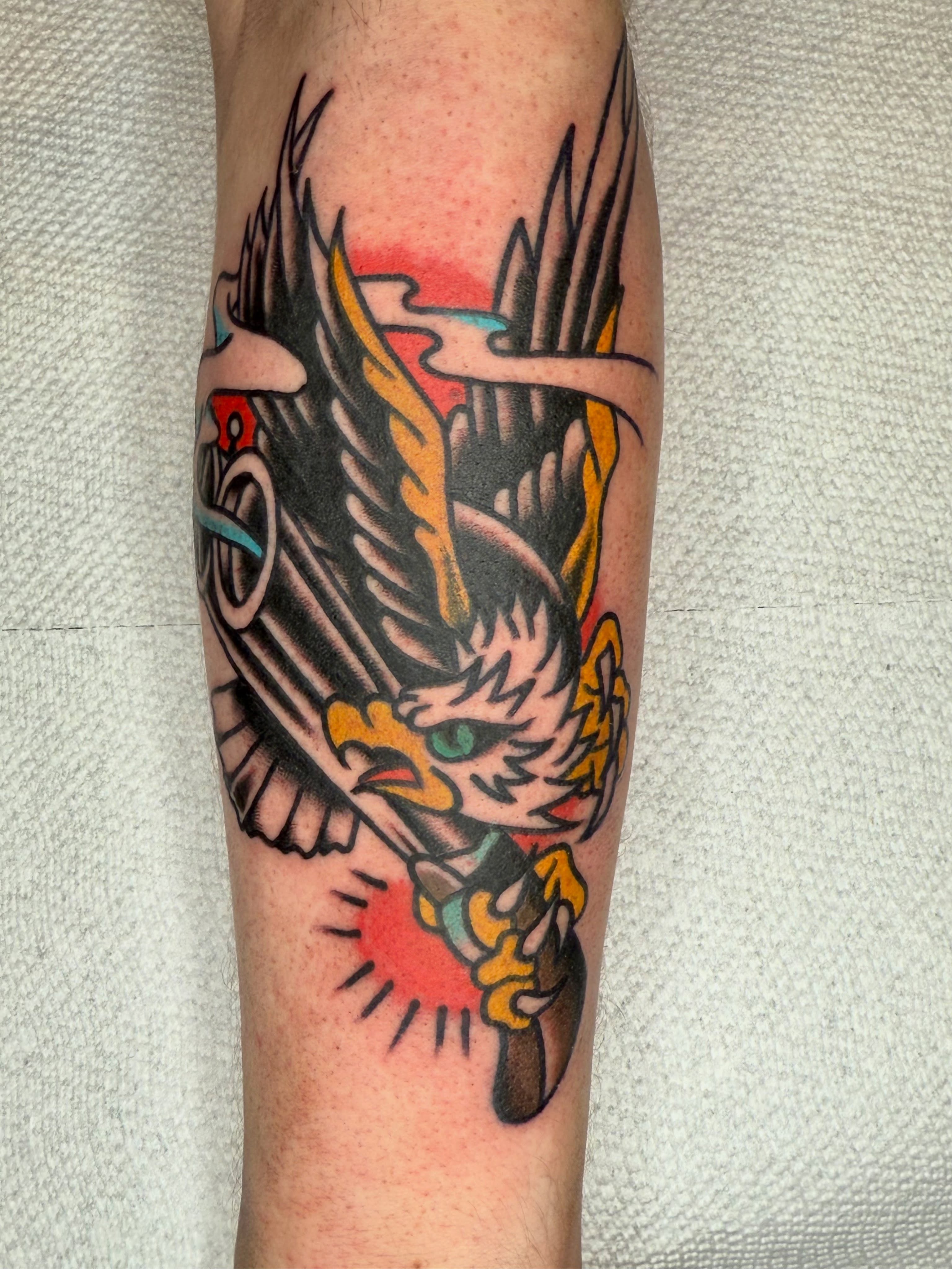 Eagle American traditional tattoo on the forearm by Jesse Coldiron